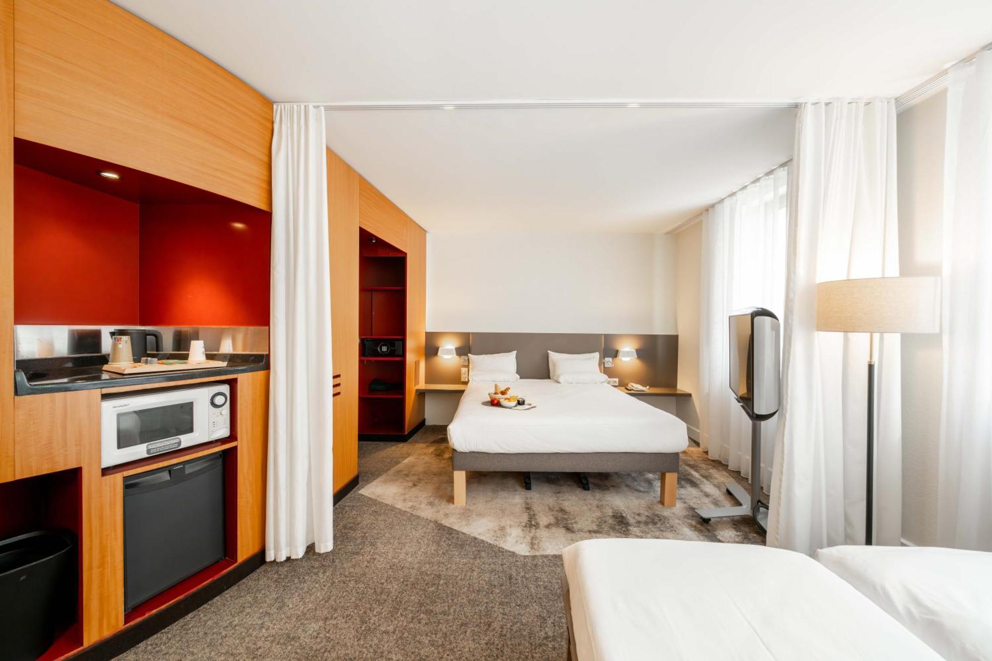 Suite Supérieure avec Lit Queen-Size et 2 Lits Simples 
