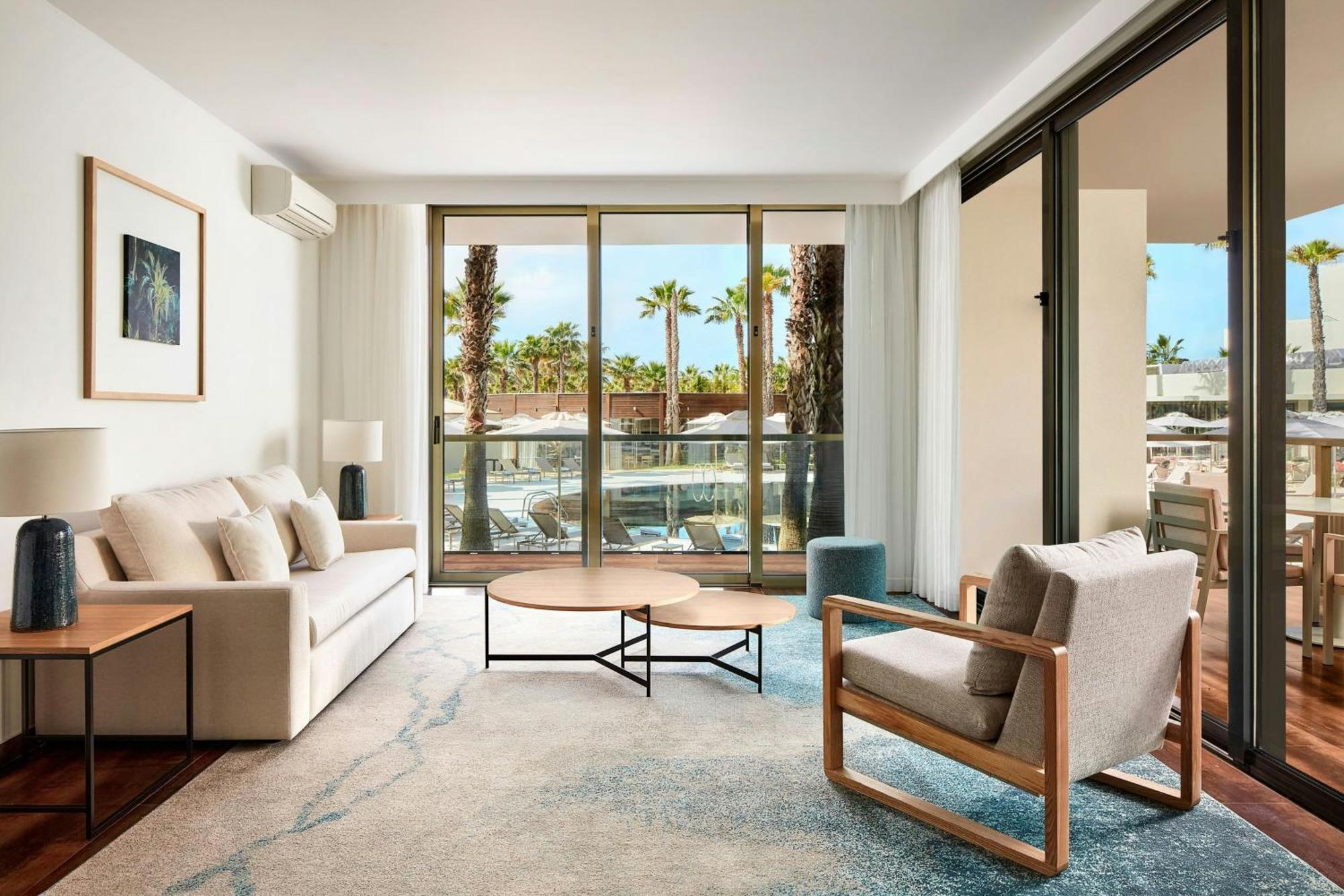 Three-Bedroom Suite Balcony Pool View