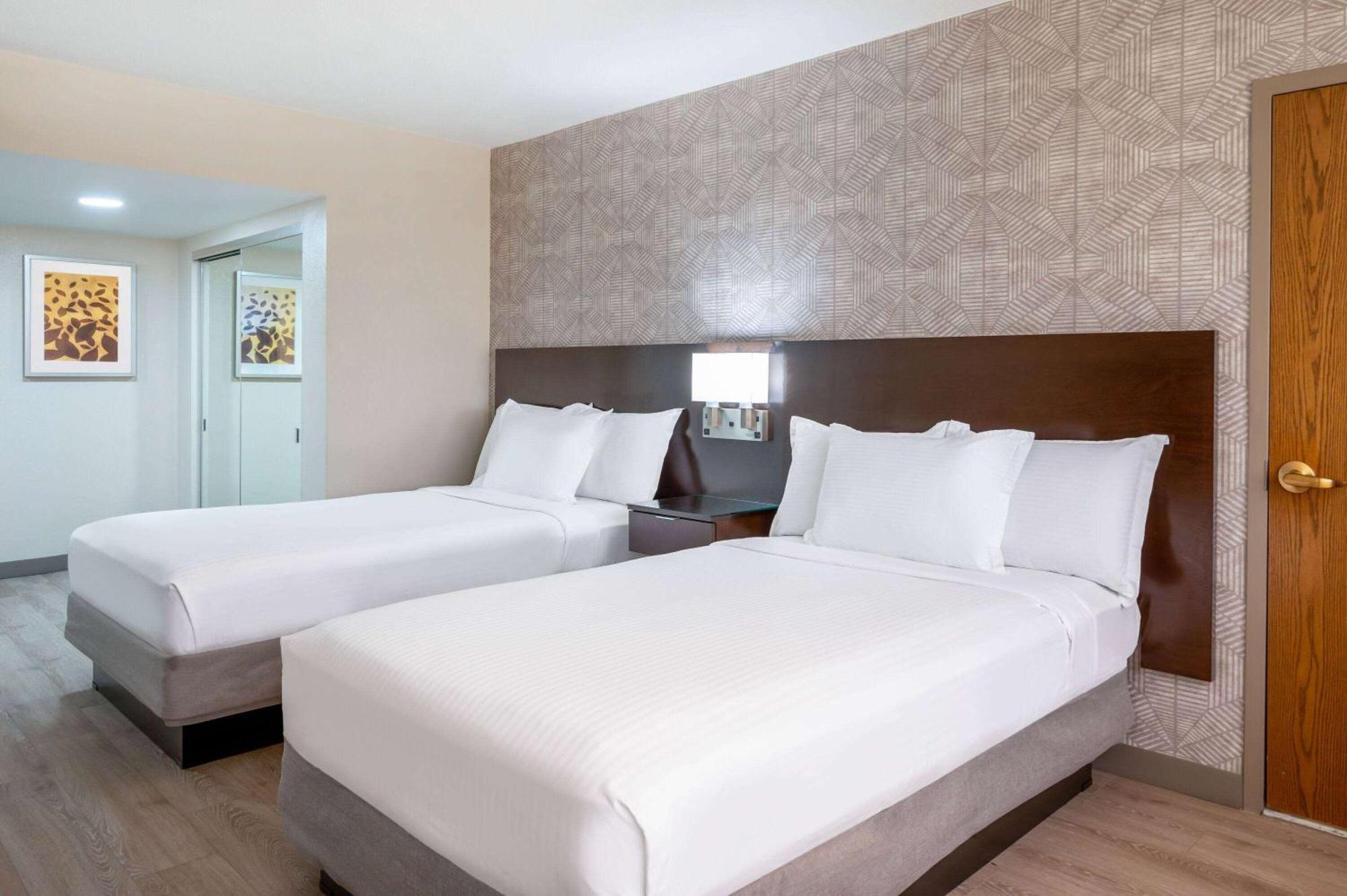 Queen Room Two Queen Beds Roll Shower Mobility Accessible or Non-Smoking