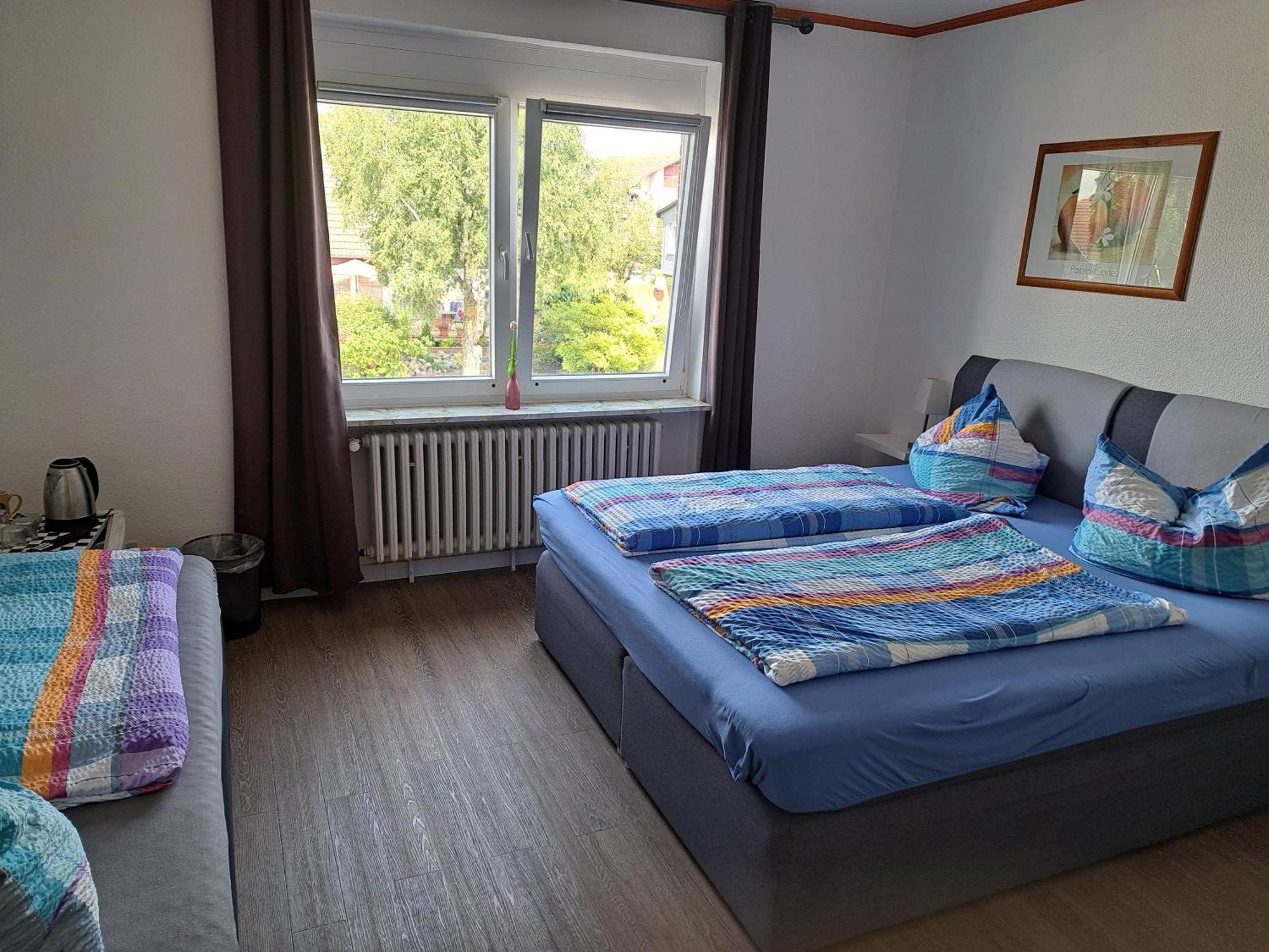 Dreibettzimmer