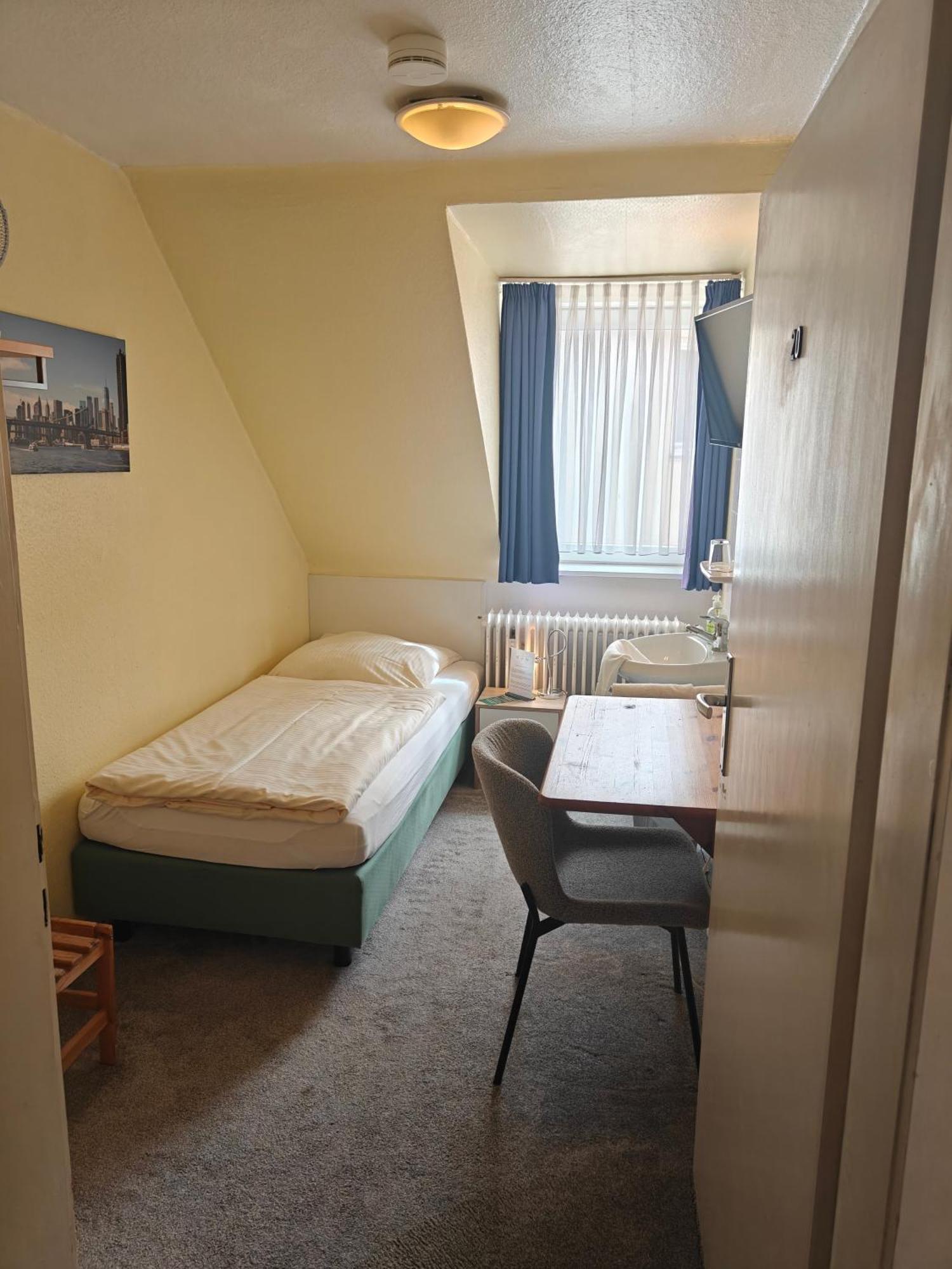 Economy Single Room Shared Shower Toilet