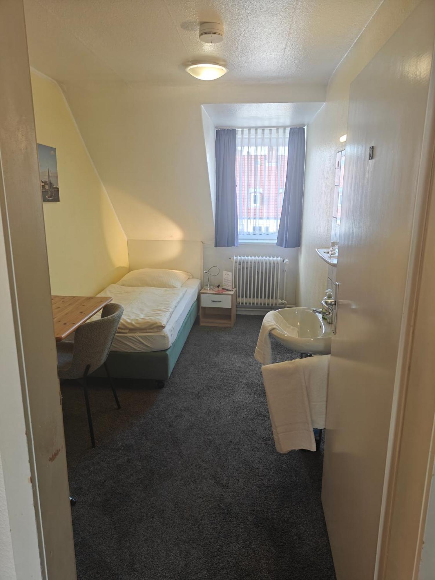 Single Room Shared Shower Toilet
