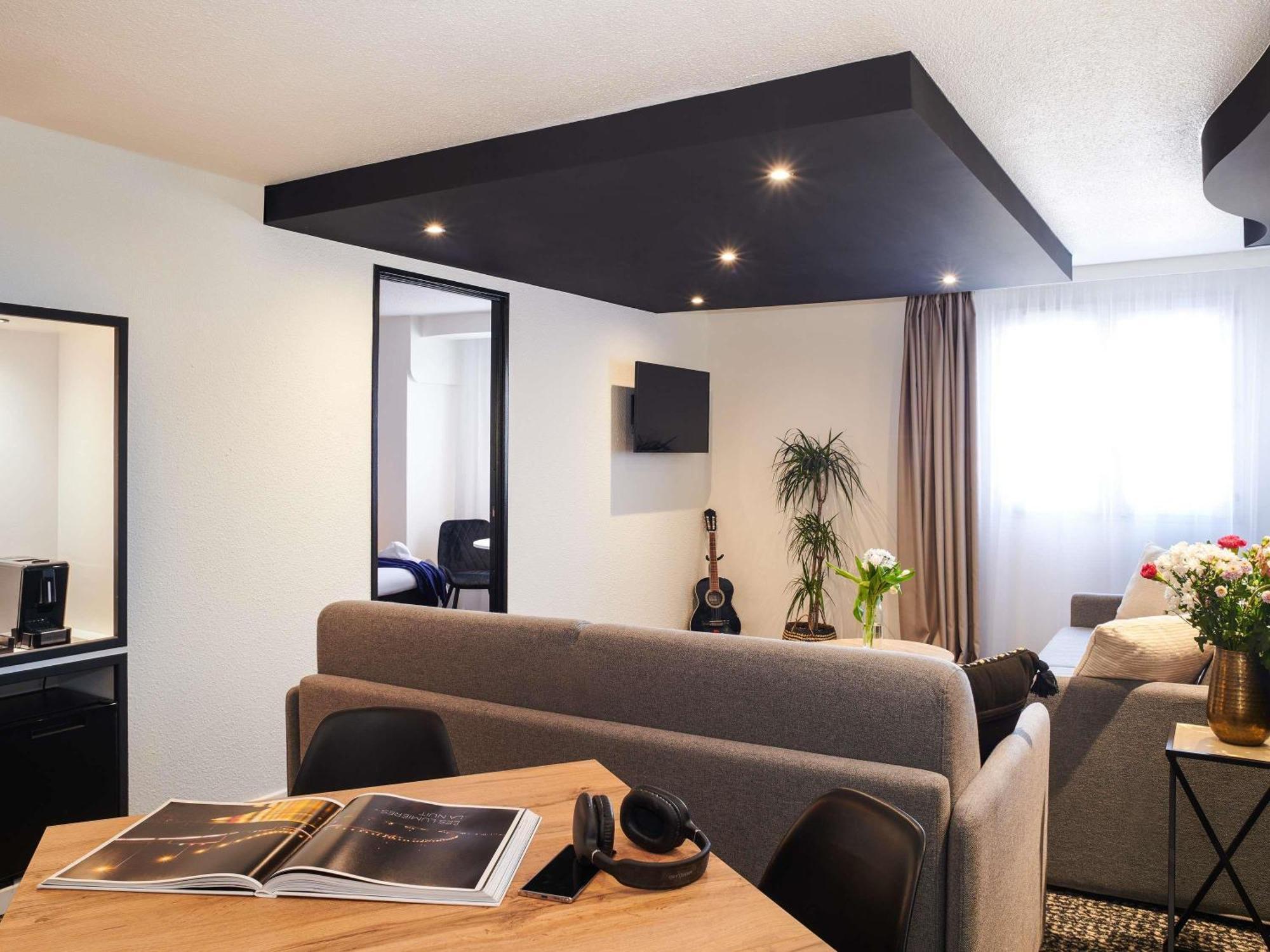 Suite Junior avec 1 Lit Queen-Size et 2 Canapés-Lits