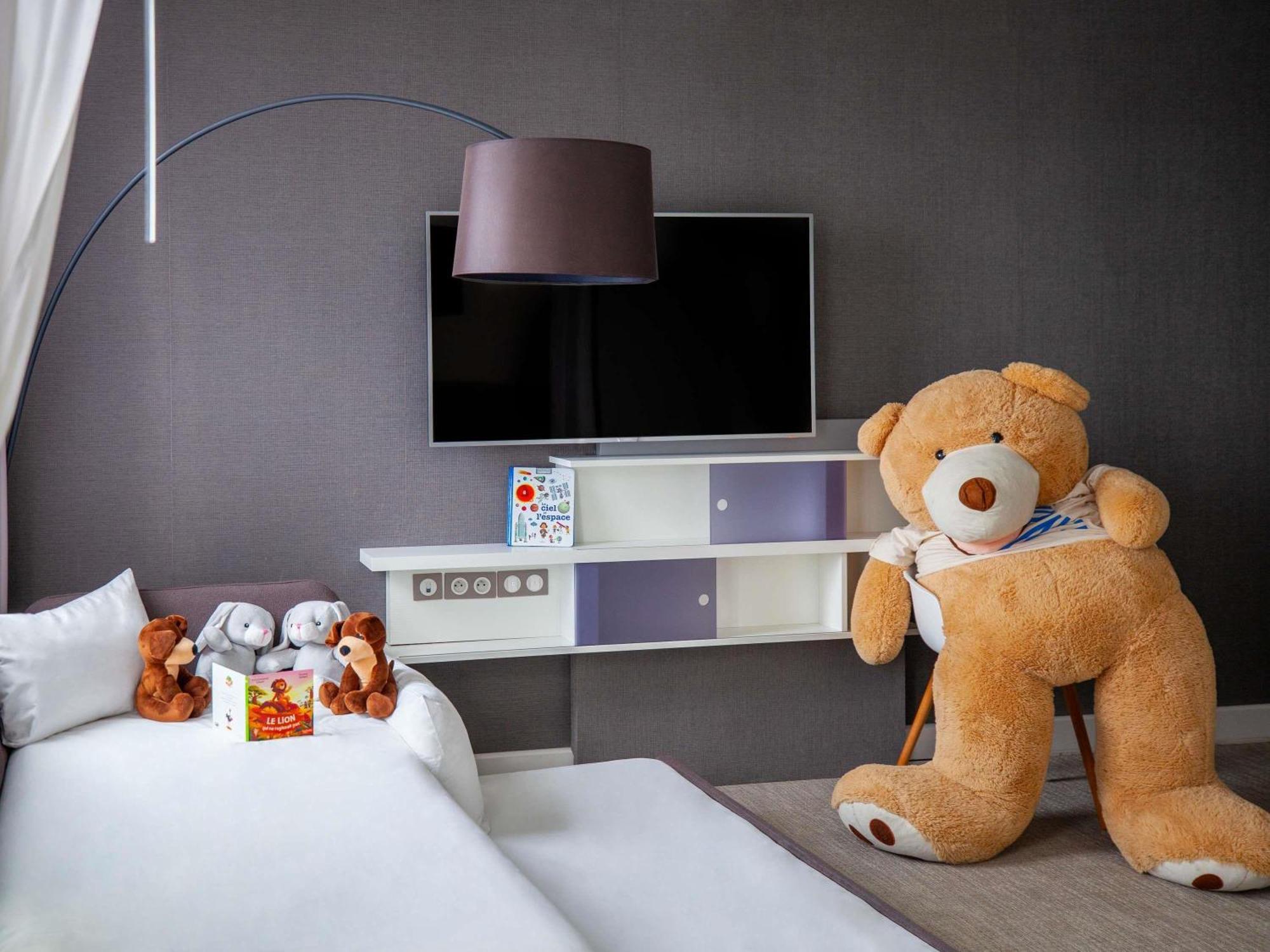 Suite Supérieure avec 1 Lit Double et 2 Lits Simples