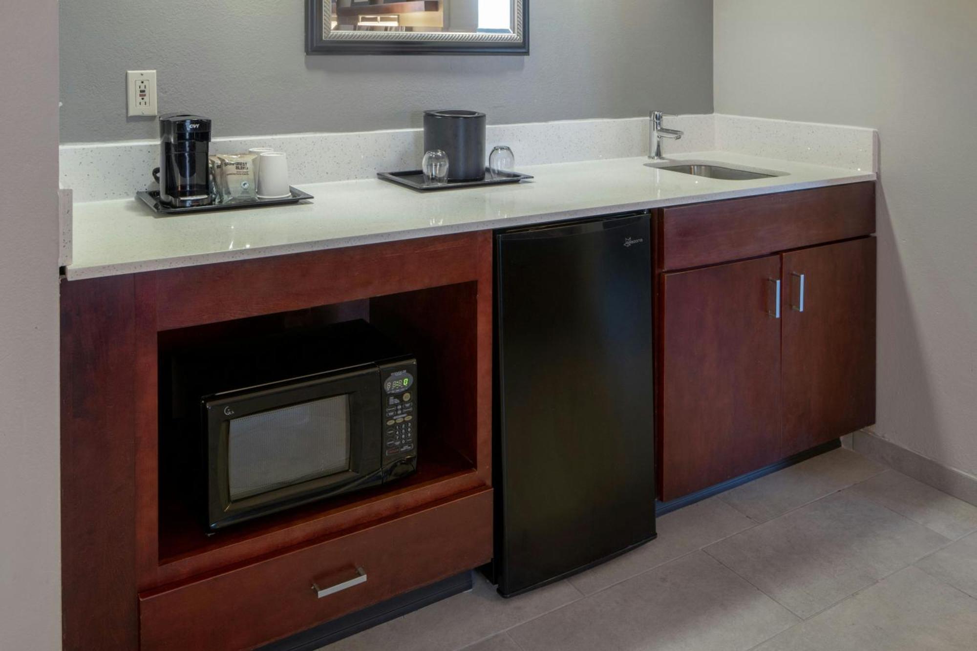 One-Bedroom King Suite Balcony Roll Shower Sofa Bed Mobility Access or Hearing Accessible
