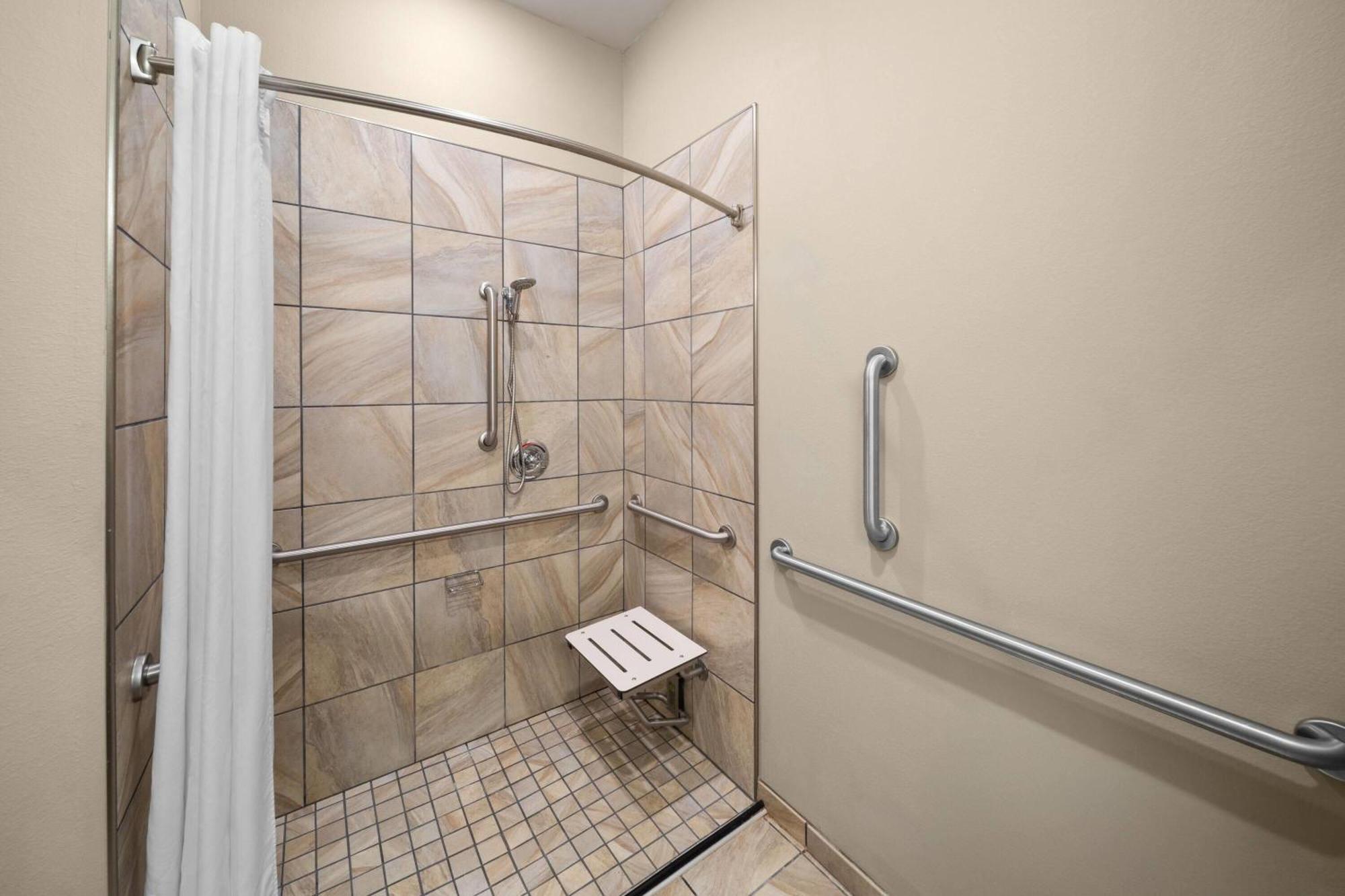 King Room Mobility or Hearing Access Roll Shower Non-Smoking