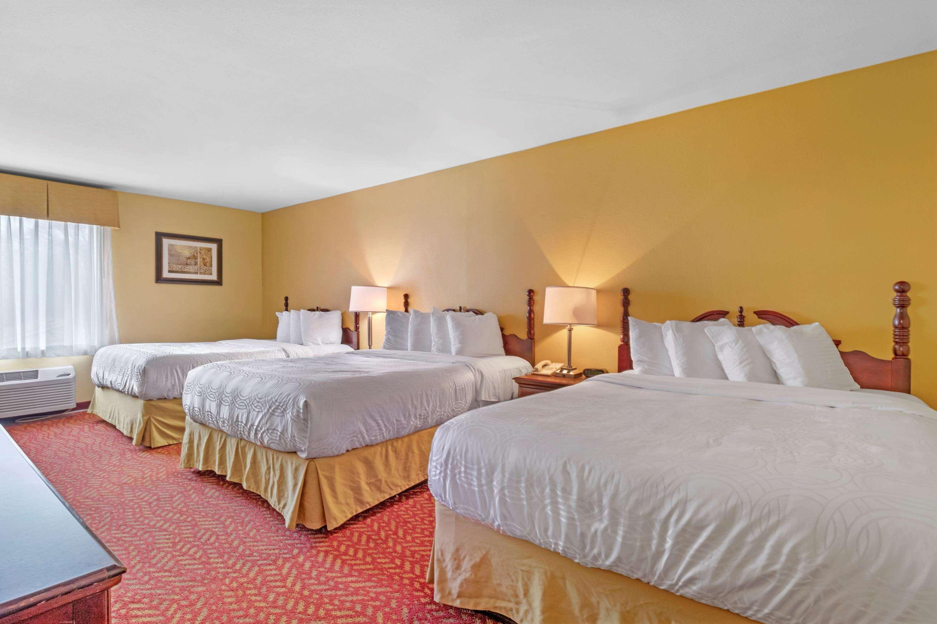 Queen Suite with Three Queen Beds and Sofa Bed - Non-Smoking