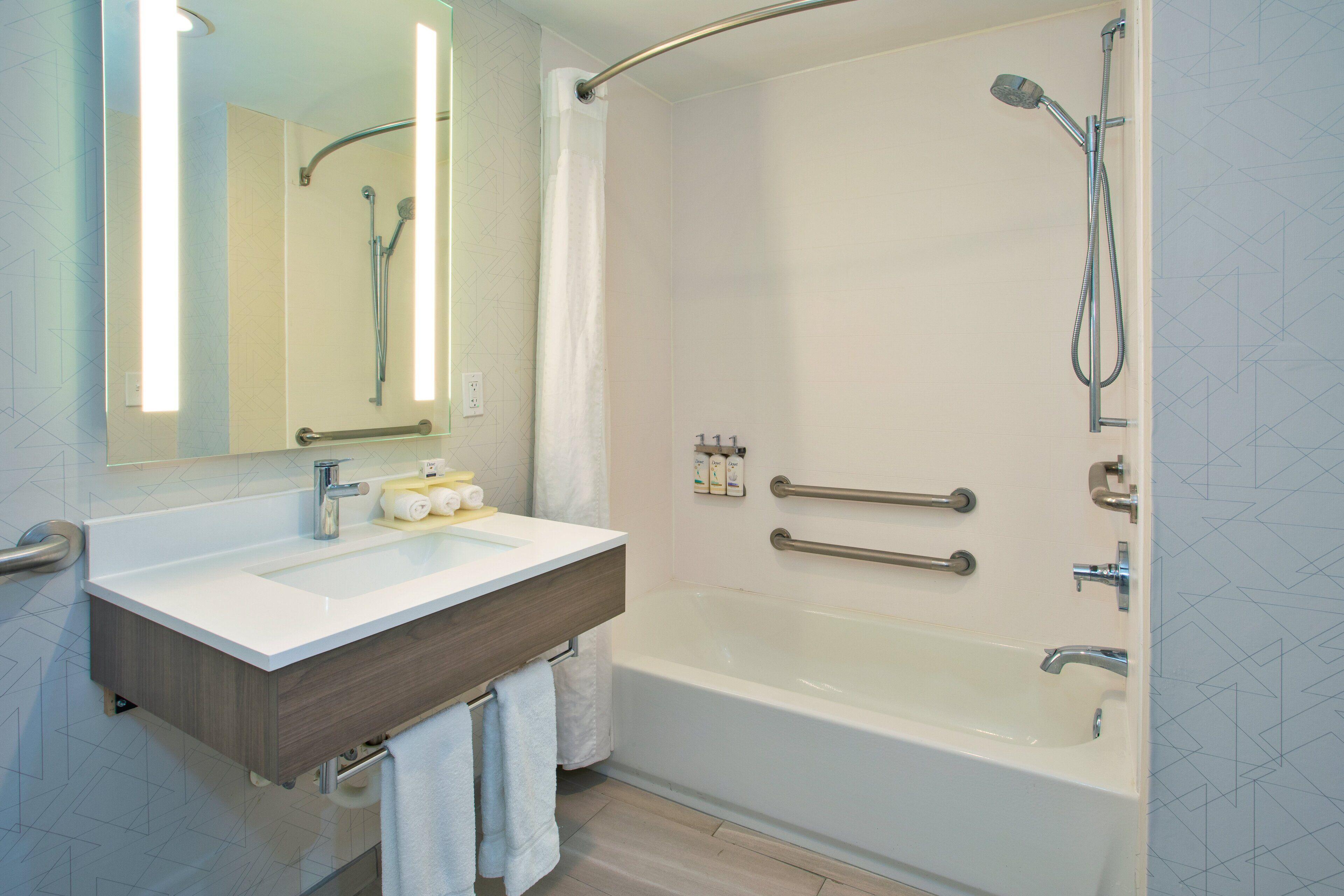 Standard Queen Room Roll Shower Mobility or Communications Accessible