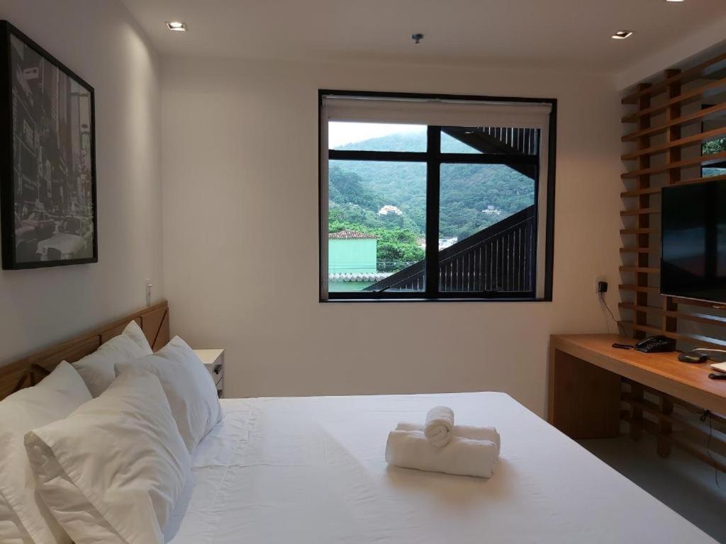 Quarto Triplo com Vista Lago