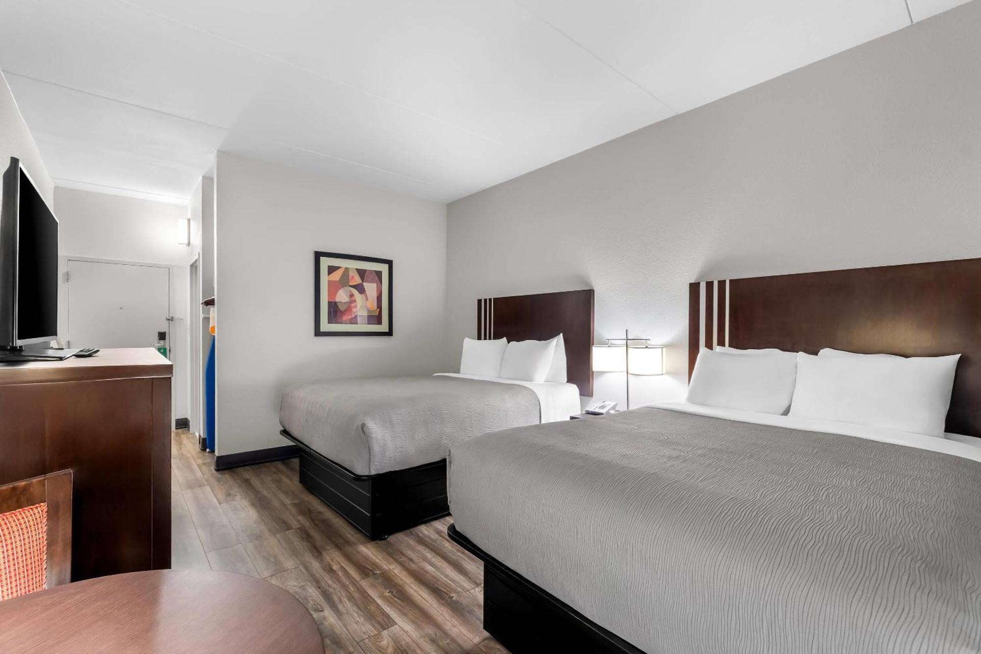 Quadruple Room Two Queen Beds Non Smoking or Interior Corridor
