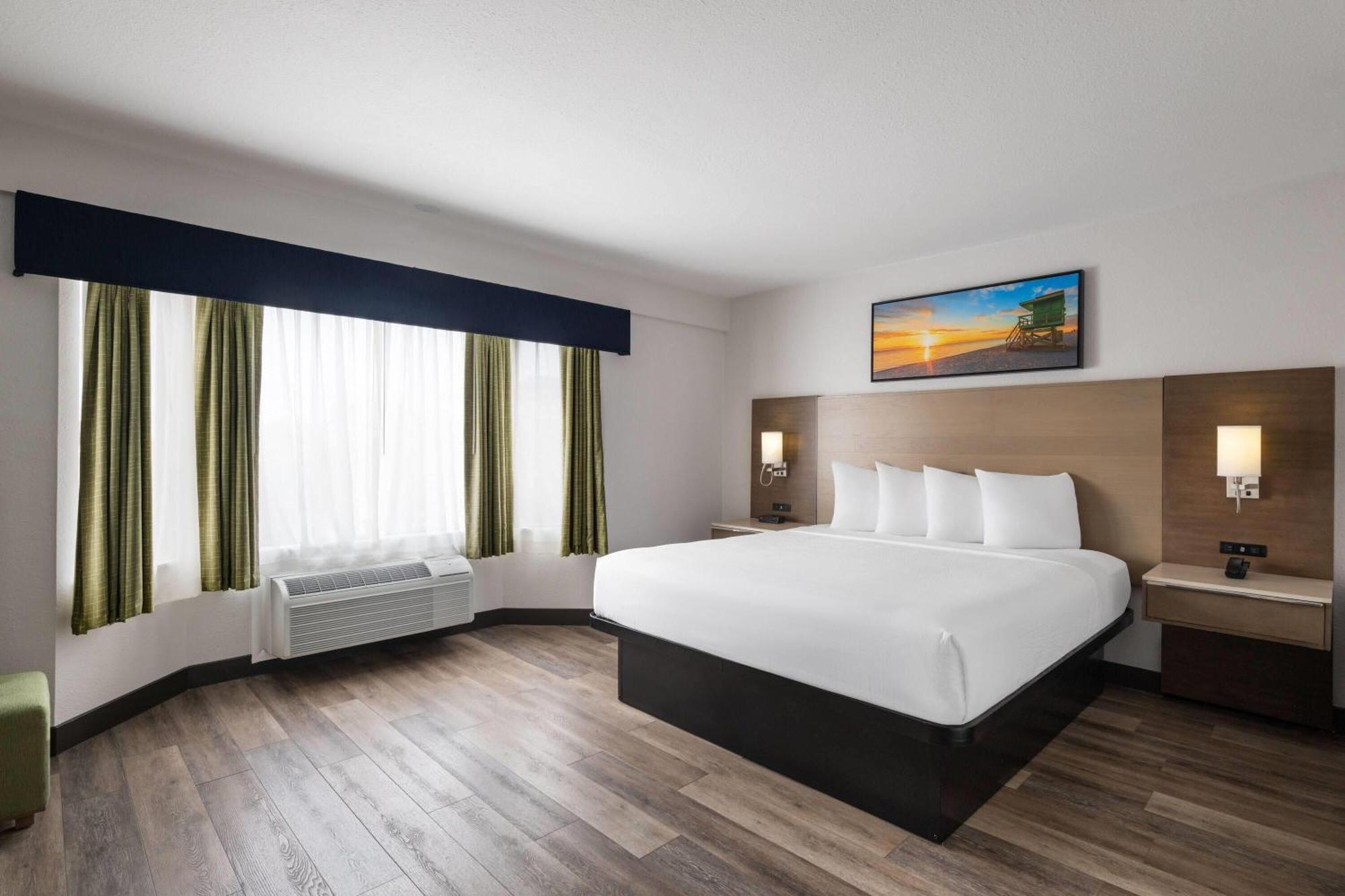 1 King Bed Mobility or Hearing Impaired Accessible Room Non-Smoking