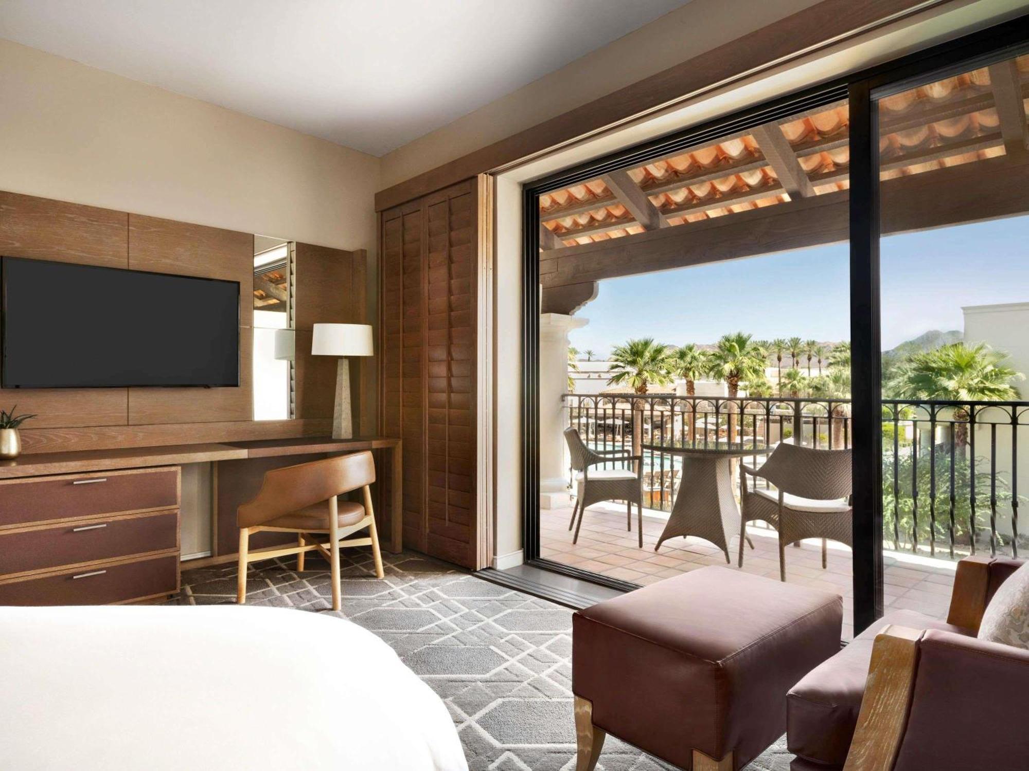 Deluxe King Room Patio or Balcony Pool View,1730058654:JPEG