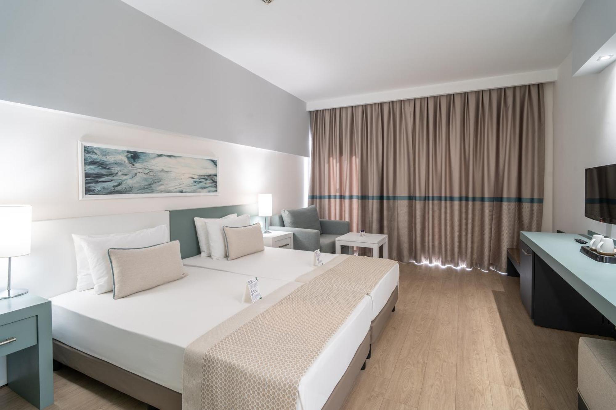 Double or Twin Room with Side Sea View,1731396770:JPEG