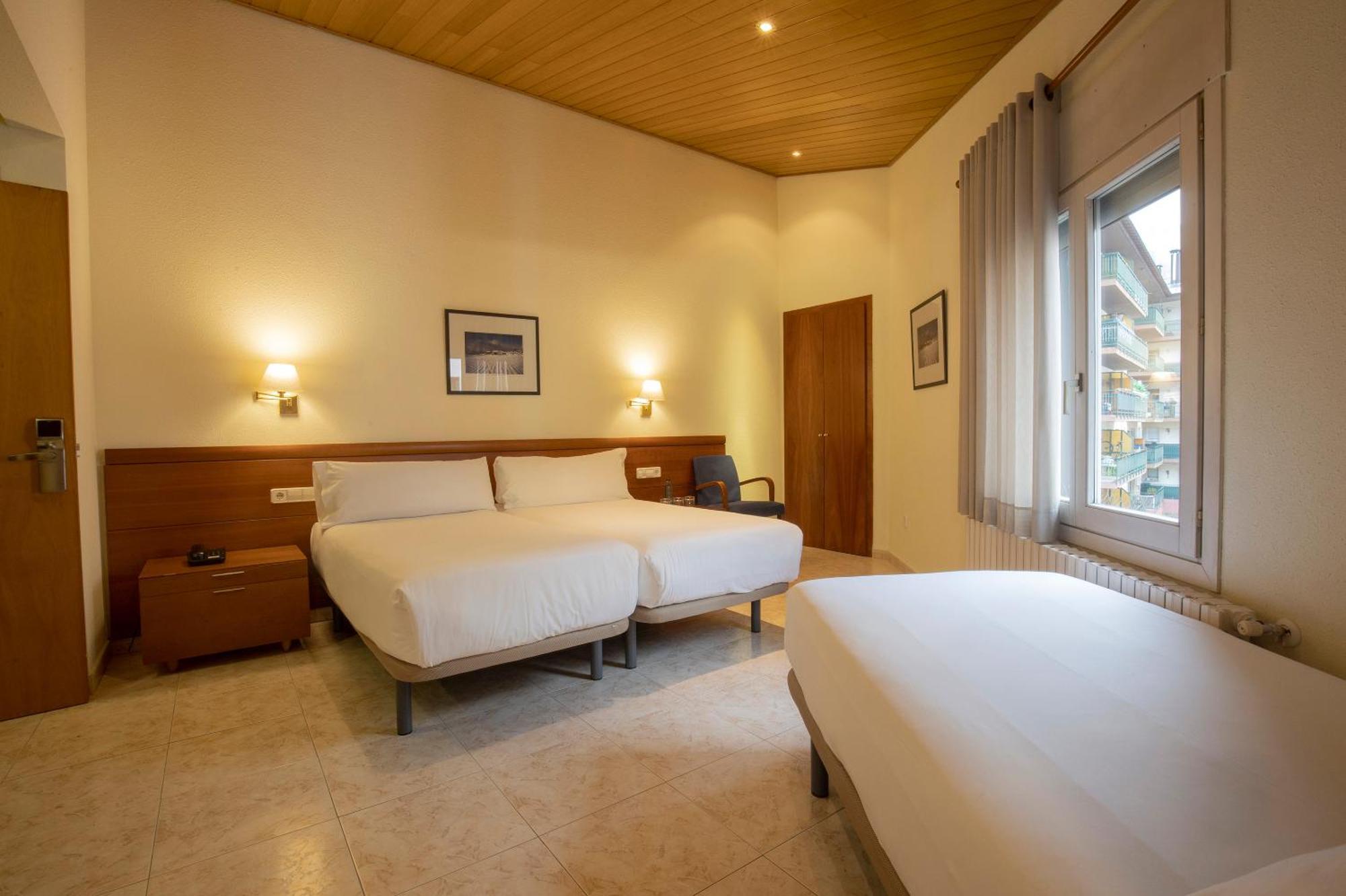 Habitación Triple (2 adultos + 1 niño)