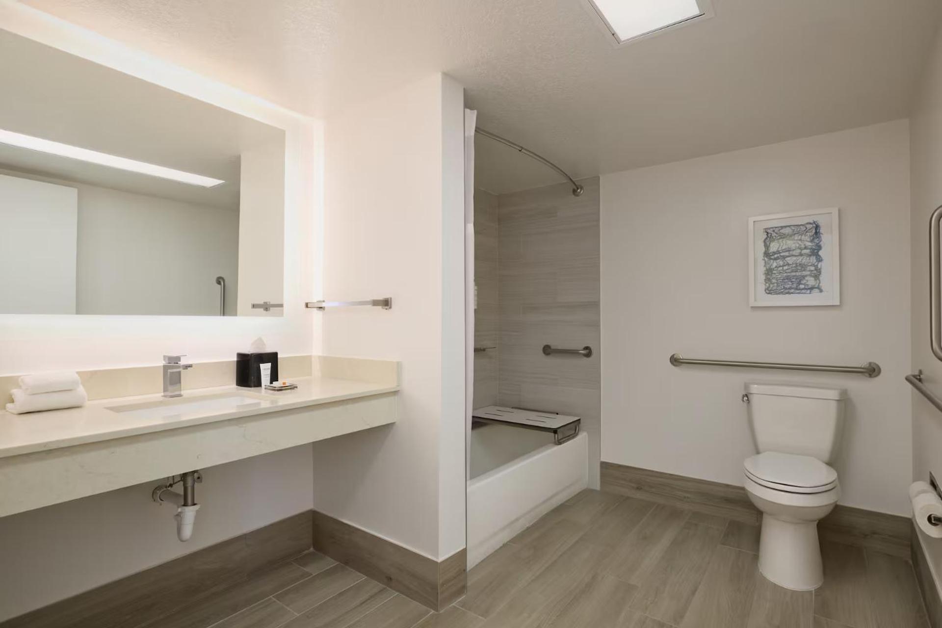 Queen Room Roll Shower Mobility or Hearing Accessible