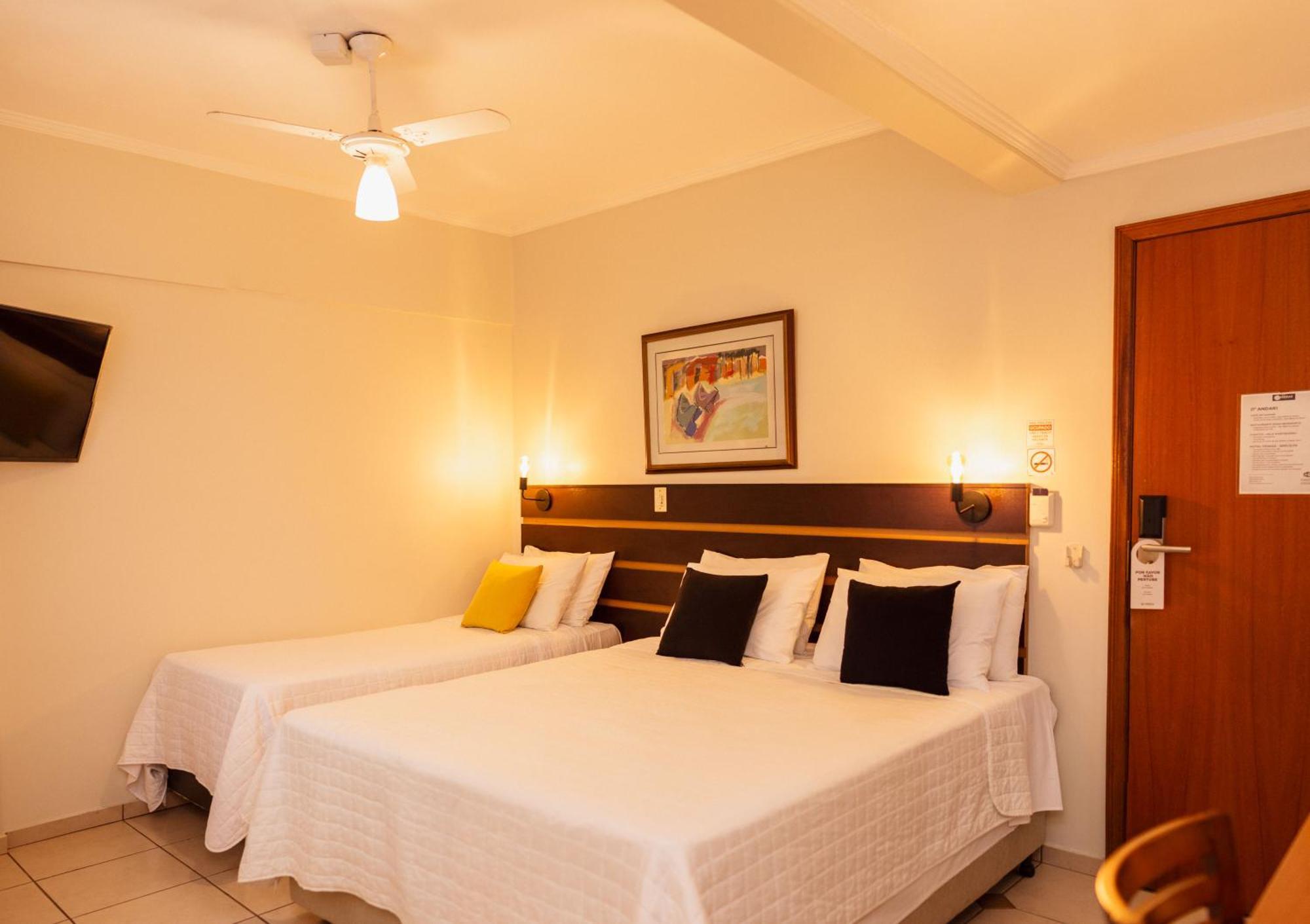 Quarto Triplo Executivo