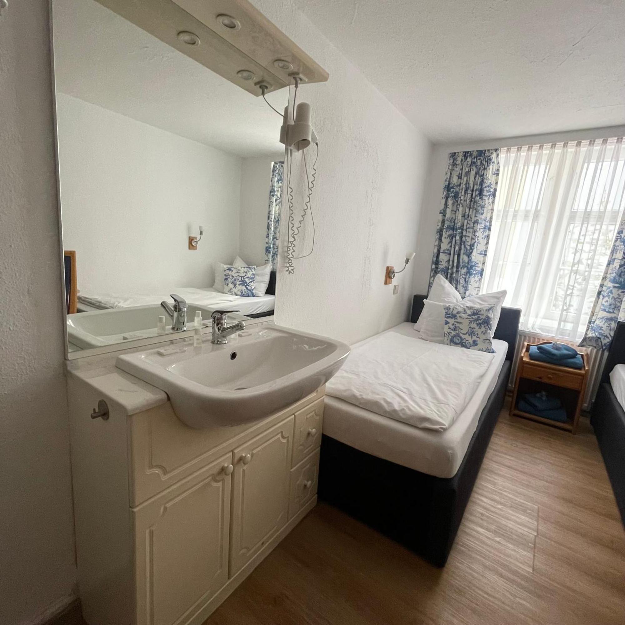 Standard Twin Room external shared WC Shower