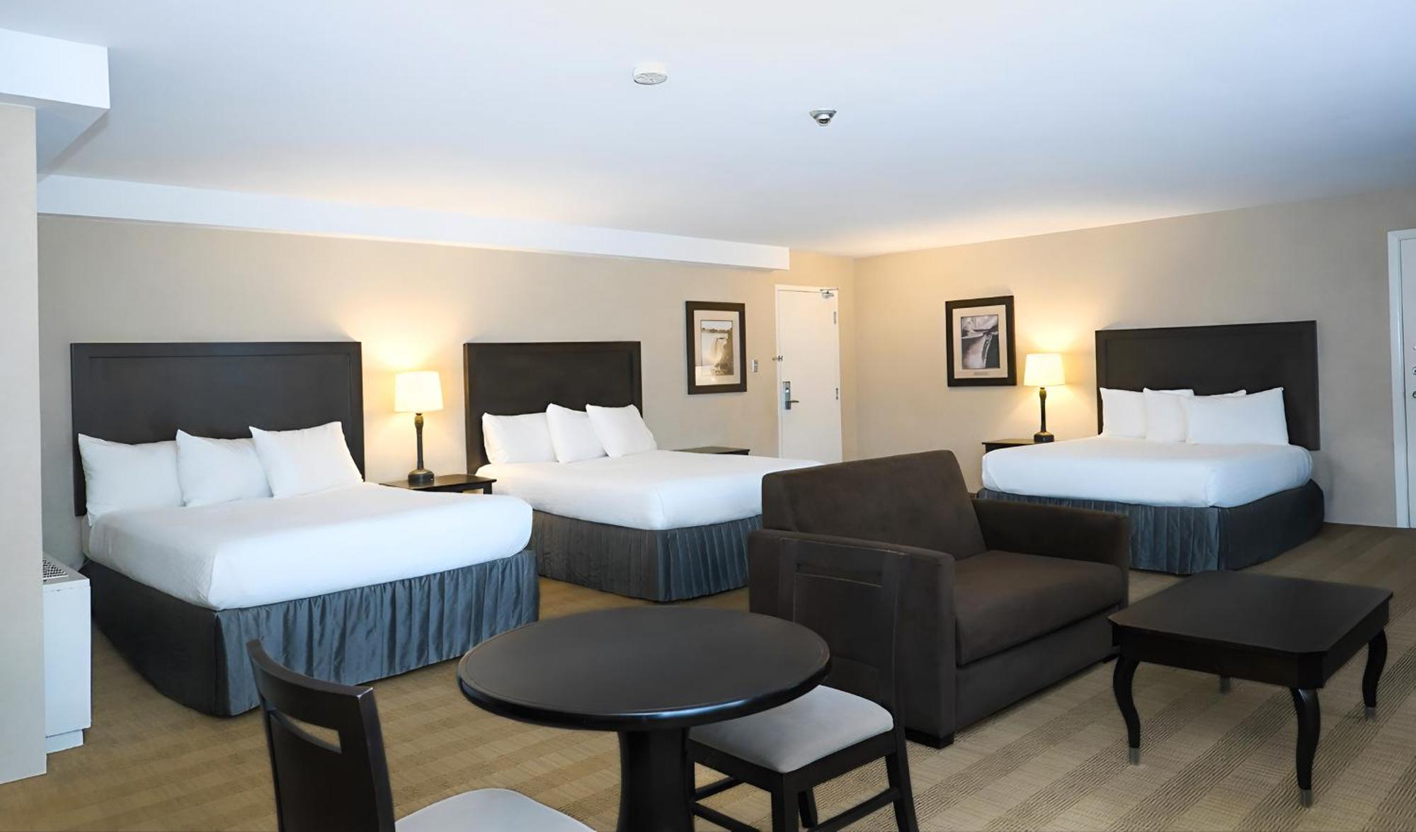 Family Suite Three Queen Room Only