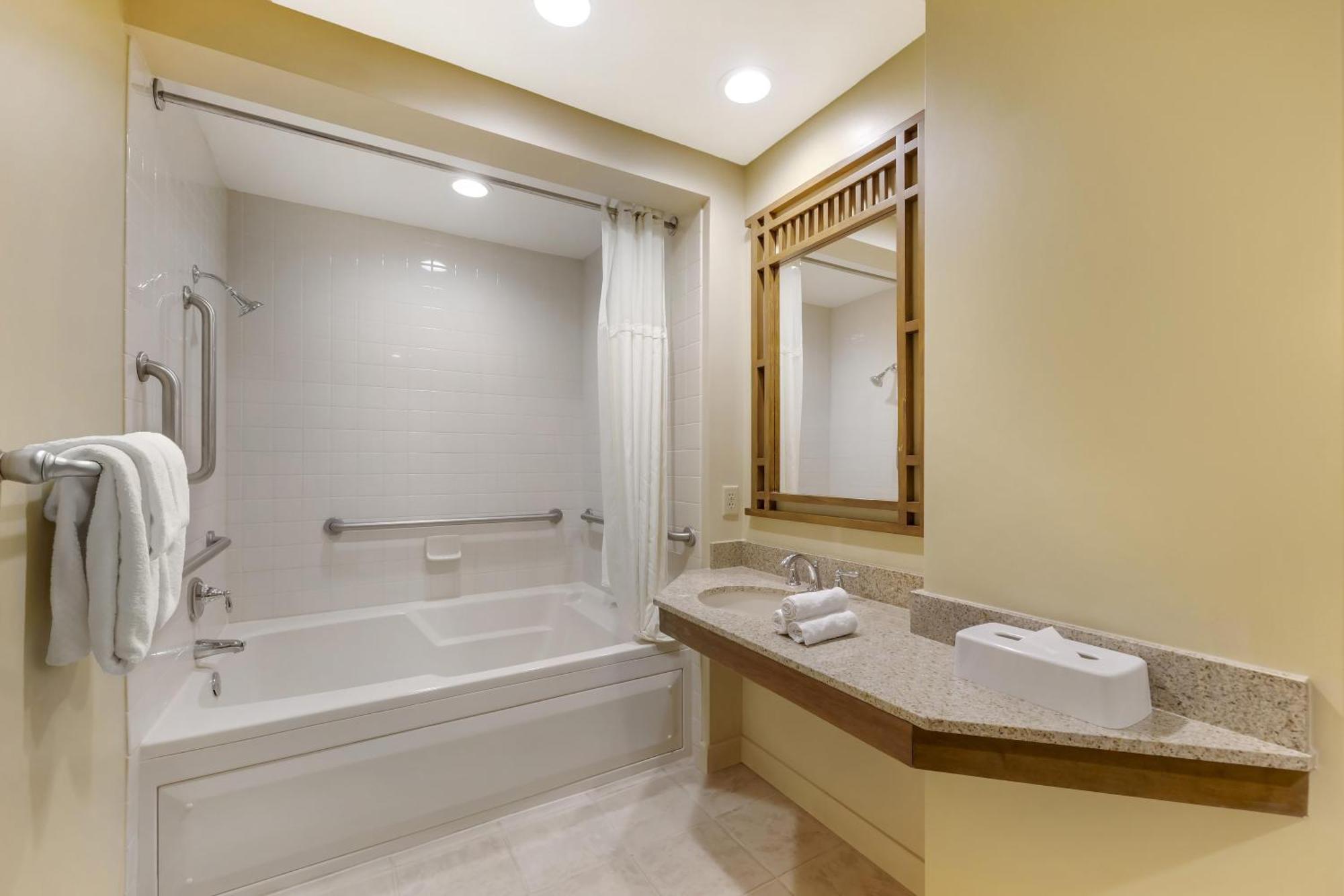 One-Bedroom King Suite One King Bed Roll Shower