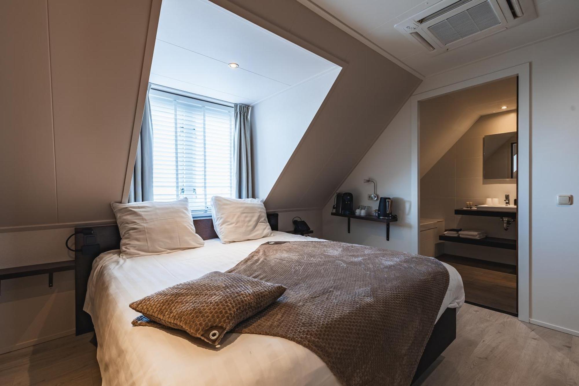 Comfort Tweepersoonskamer met 1 of 2 Bedden en Uitzicht op het Meer