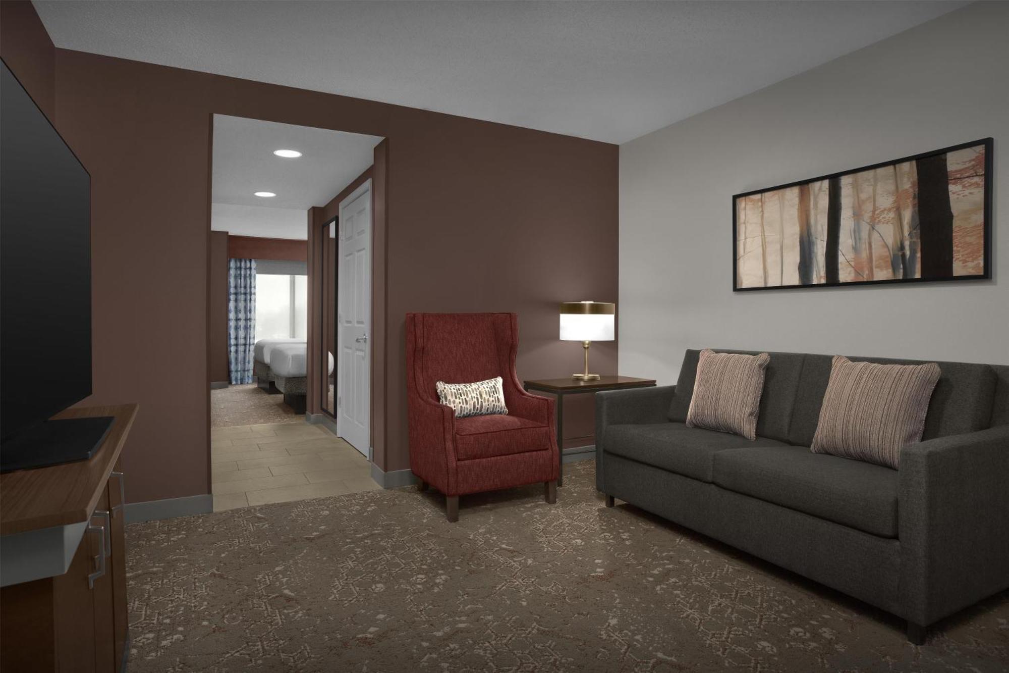 Junior Suite with Two Double Beds and Sofa Bed