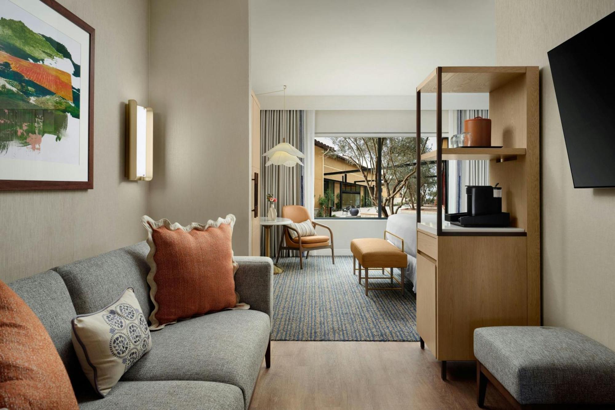 One-Bedroom Family Suite One King Bed Two Single Beds Roll Shower or Mobility Hearing Accessible