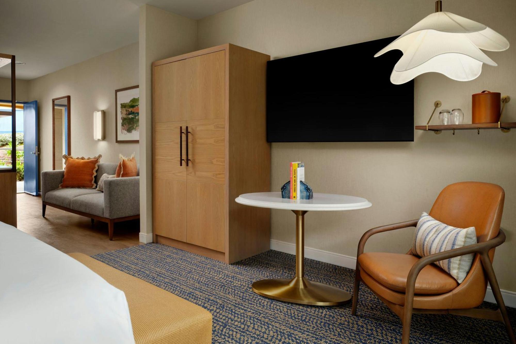 One-Bedroom Family Suite One King Bed Two Single Beds Roll Shower or Mobility Hearing Accessible