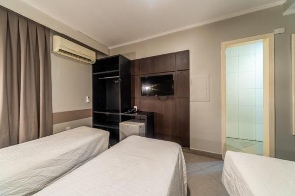 Quarto Triplo Executivo