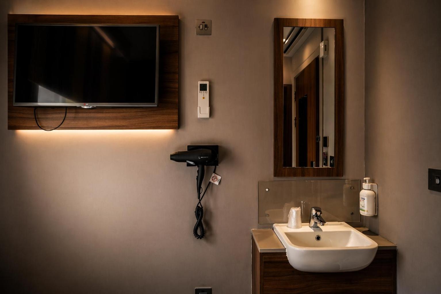 Compact Single Room Shared External Bathroom