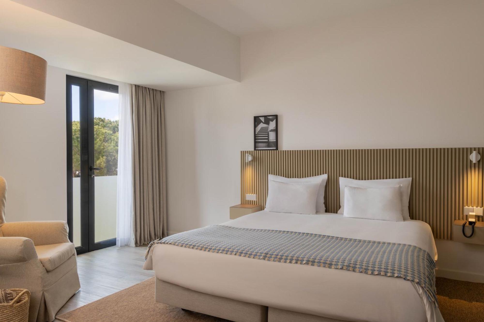 Quarto Duplo com Vista Rua