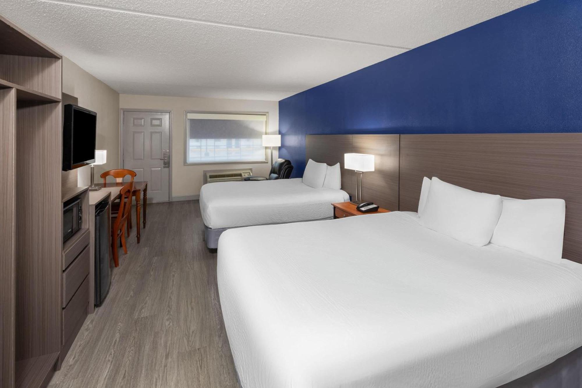 Room Two Queen Beds Mobility or Hearing Access Roll Shower Non-Smoking