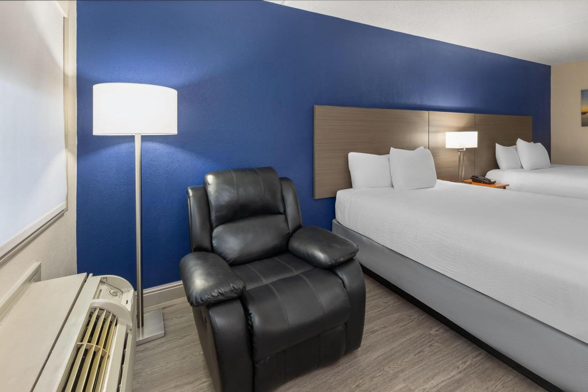 Room Two Queen Beds Mobility or Hearing Access Roll Shower Non-Smoking