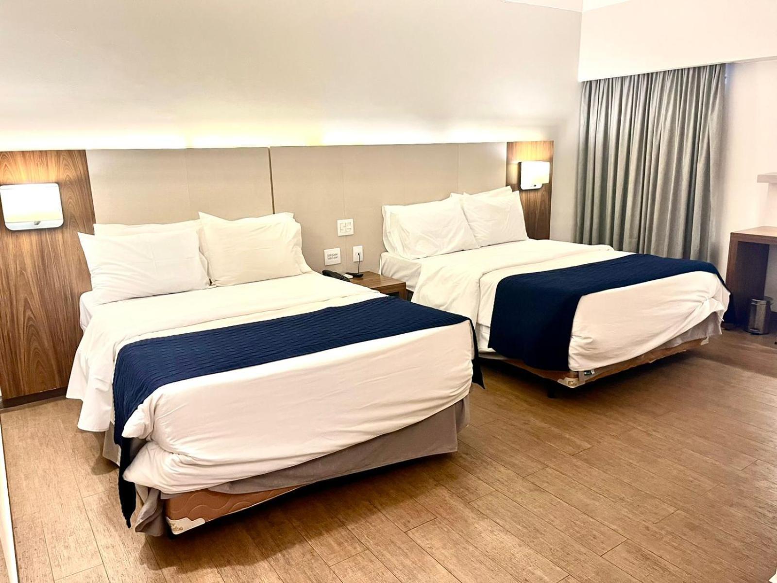 Quarto deluxe com 2 camas de casal