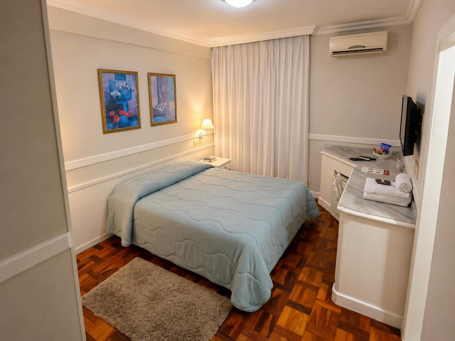 Quarto Duplo Deluxe (2 Adultos + 1 Criança)