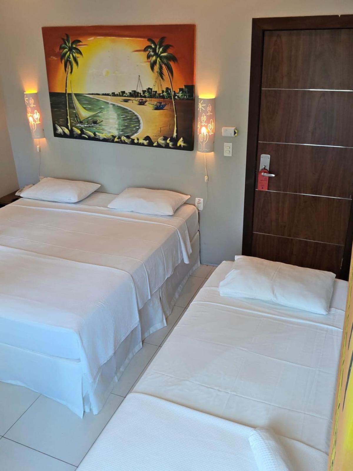 Quarto Triplo Superior com Vista do Mar