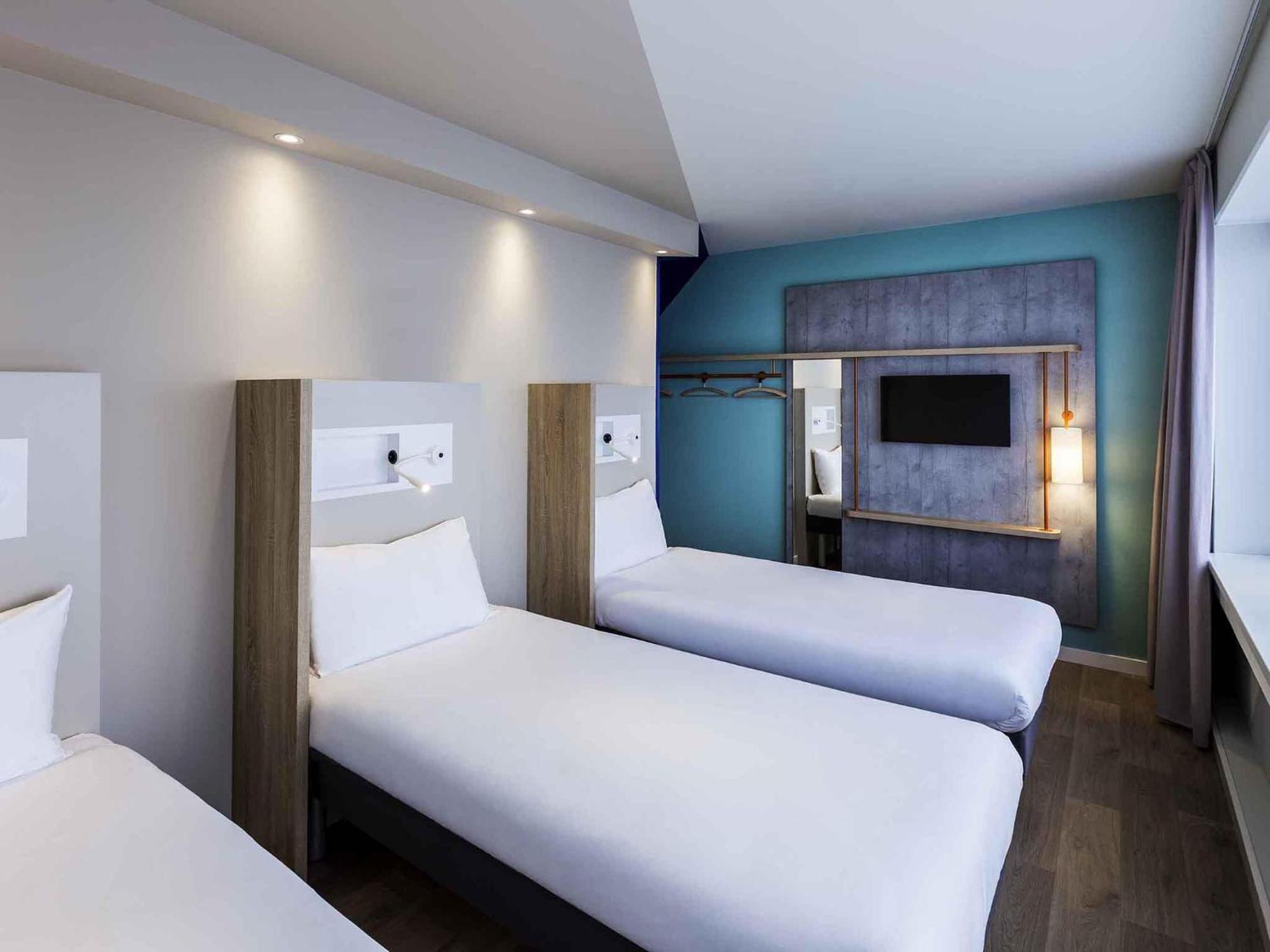 Room Three Single Beds