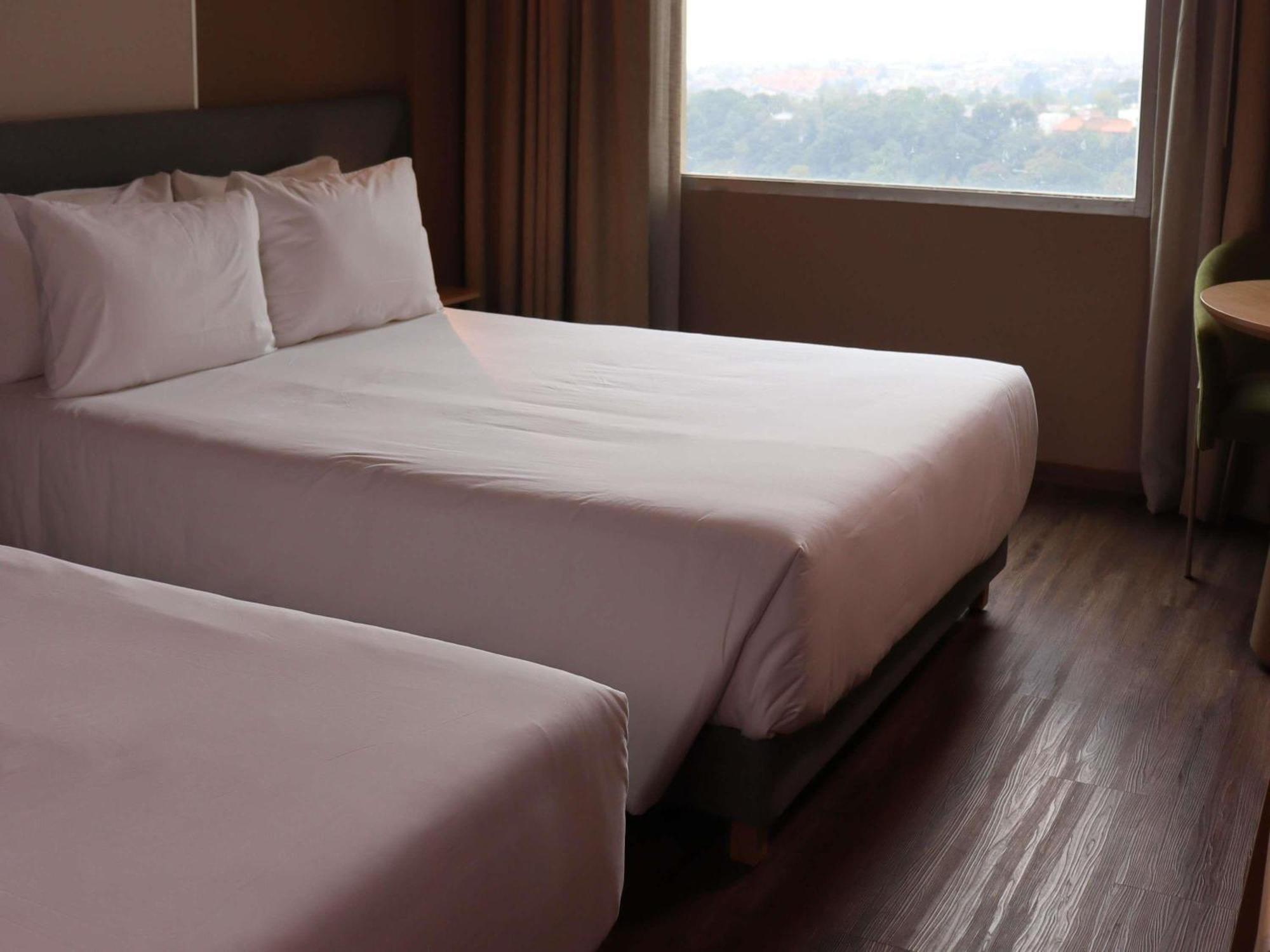 Quarto Superior com 2 Camas de Casal