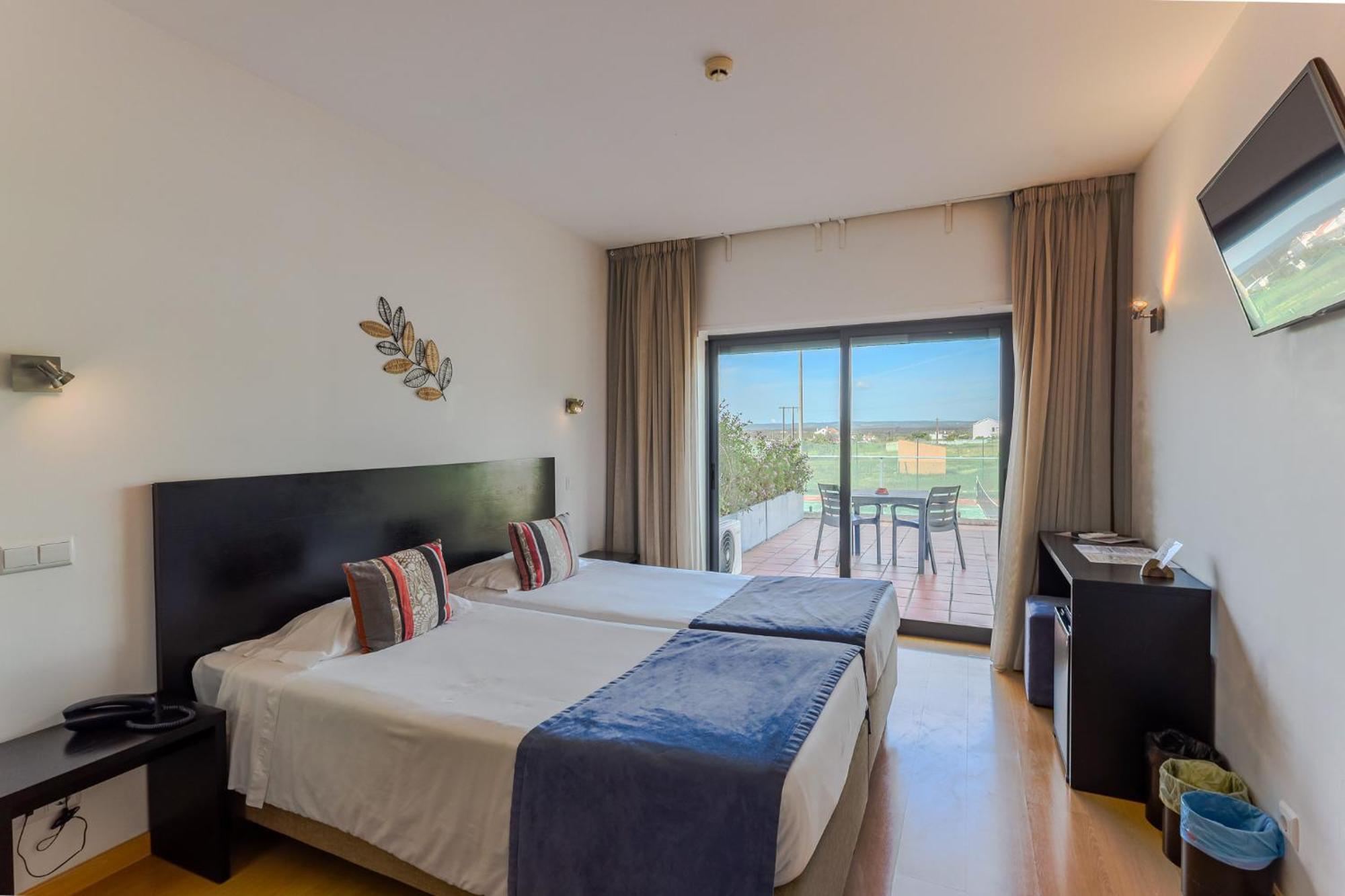 Quarto Twin com Varanda