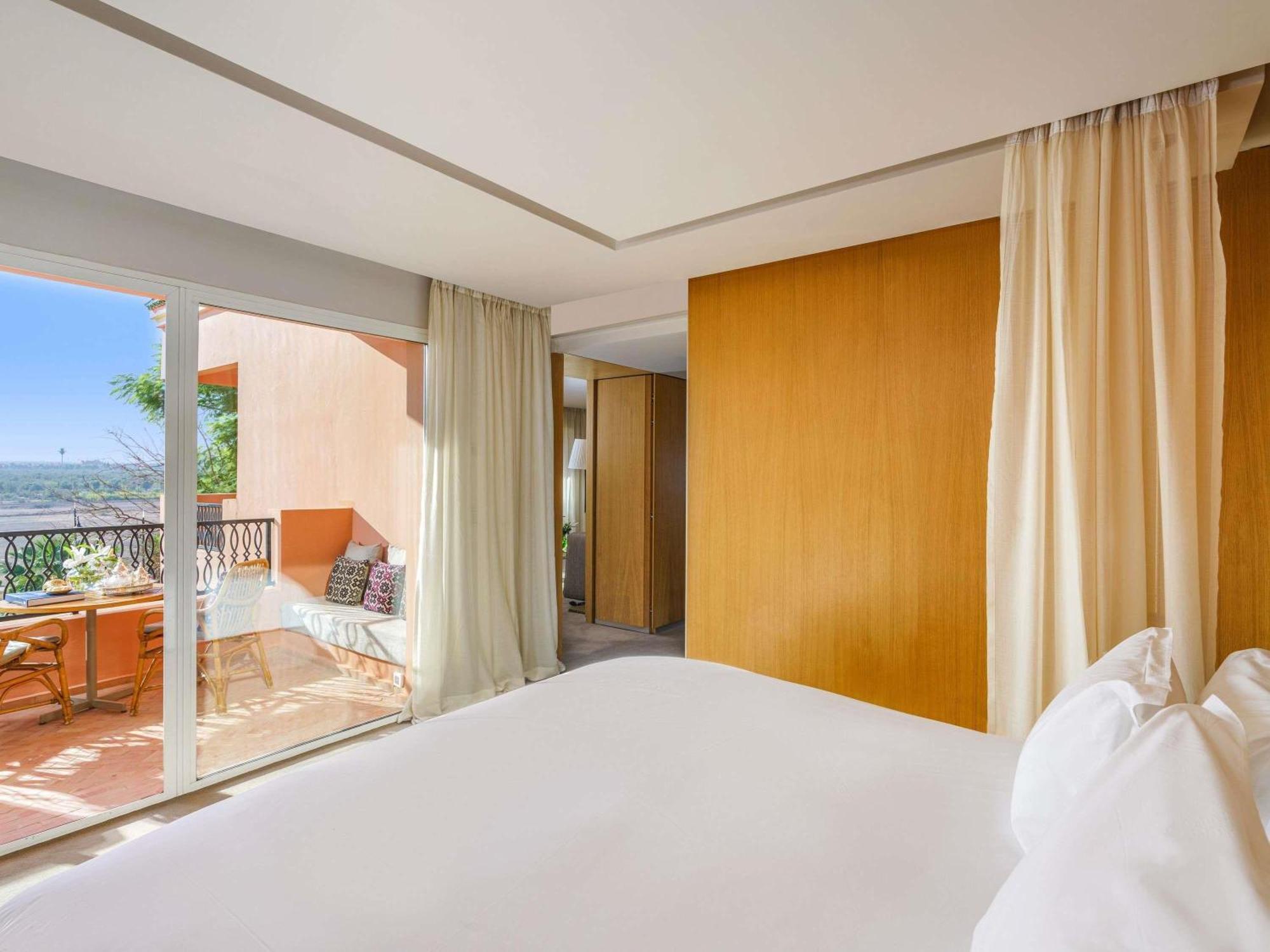Contemporary Deluxe Room Balcony Pool View