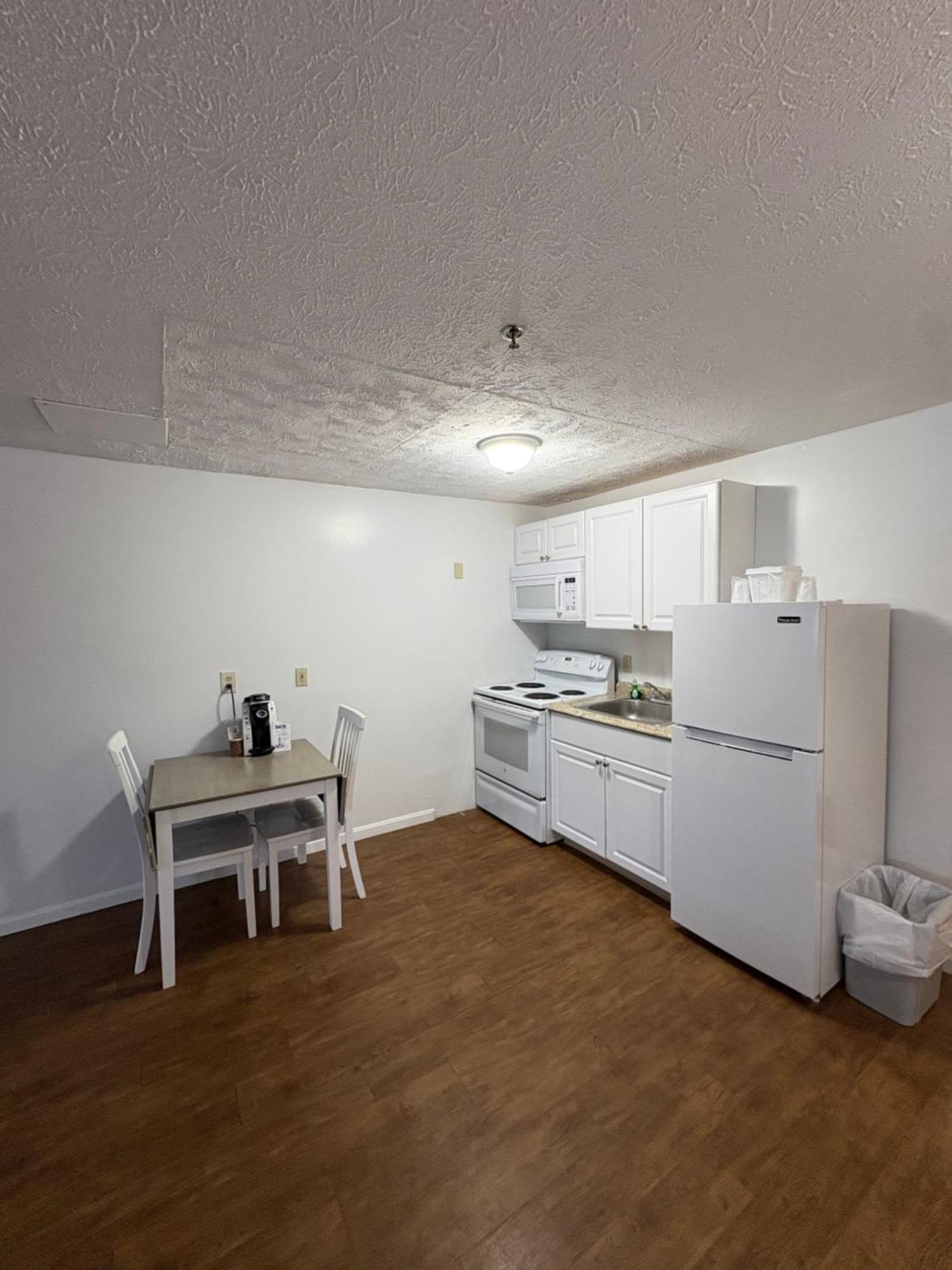 Deluxe Room Balcony Full Kitchen
