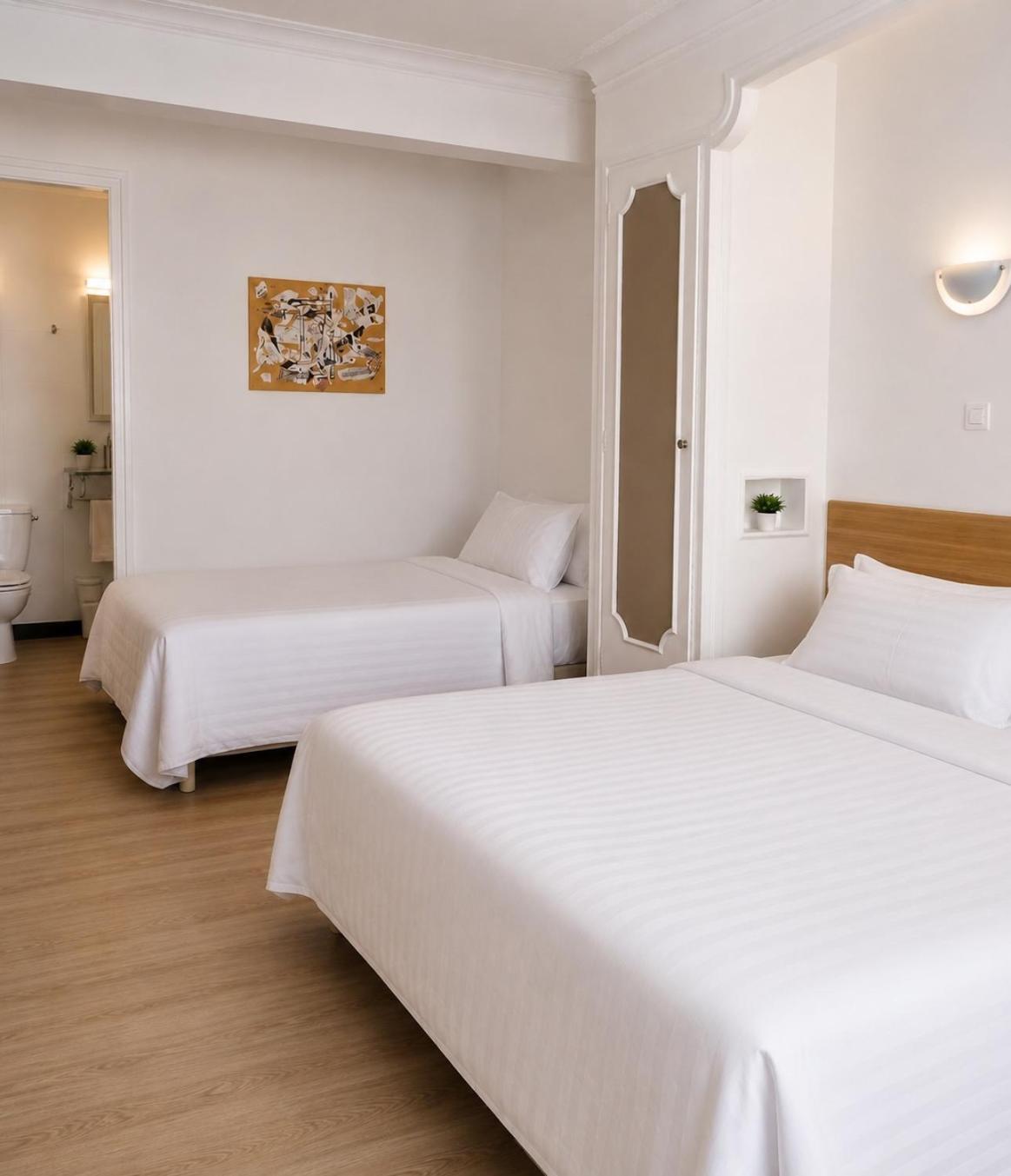 Chambre Triple avec Climatisation