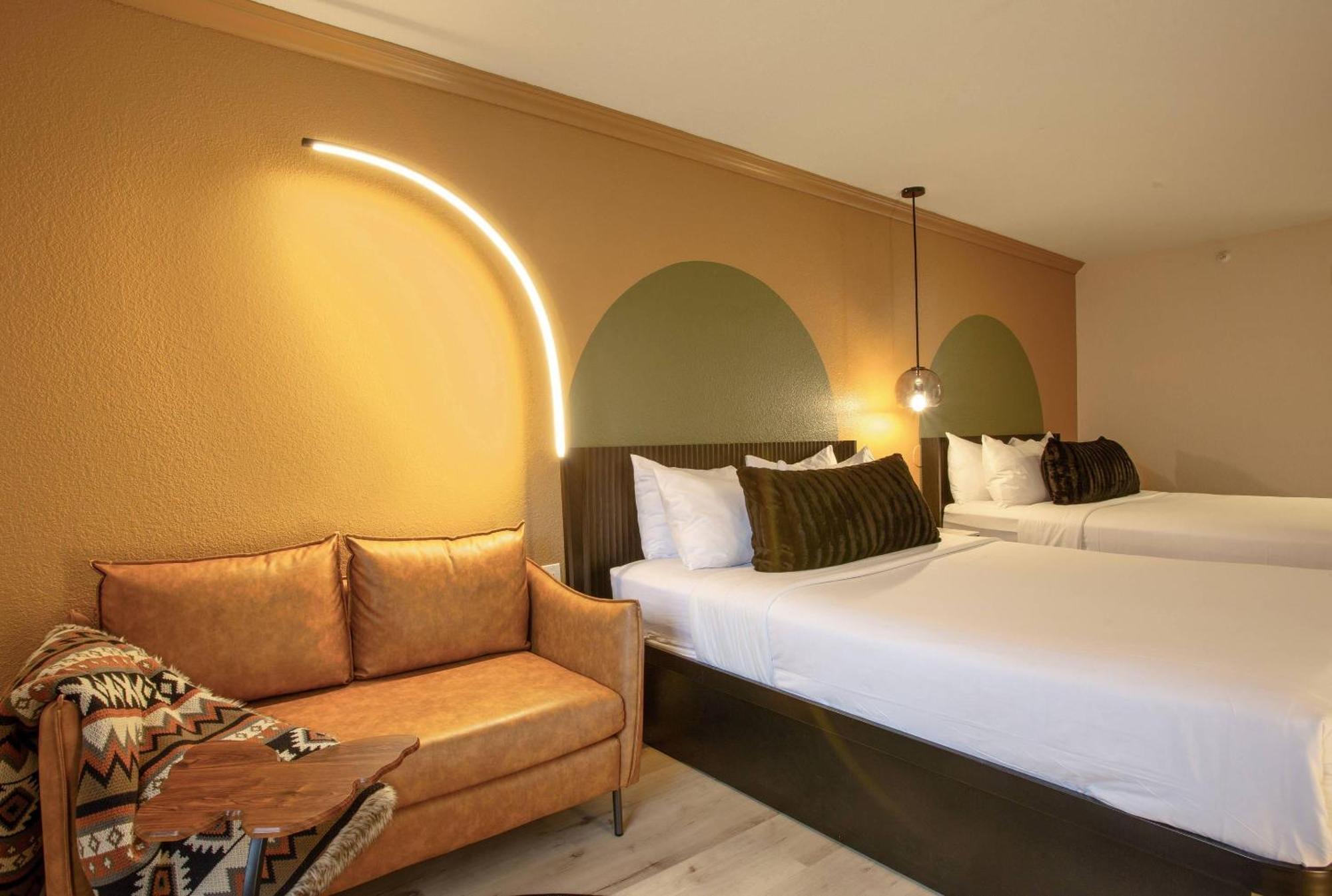 Room with Two Queen Beds and Sofa
