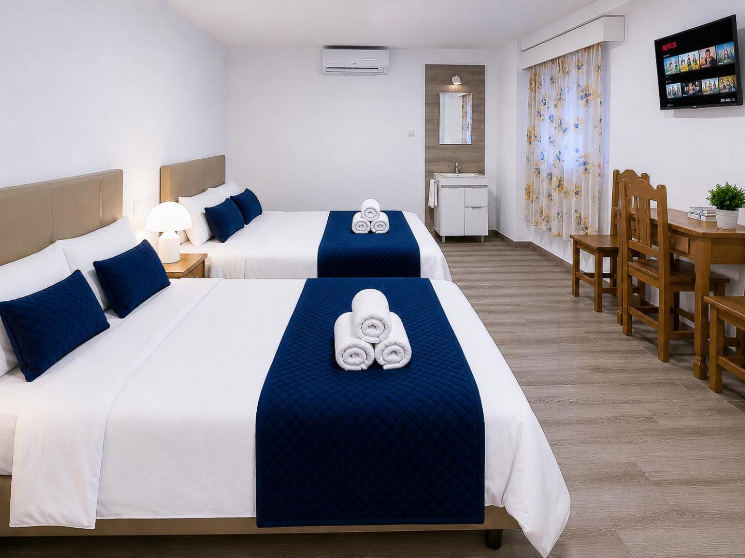 Chambre Quadruple avec Salle de Bains Commune