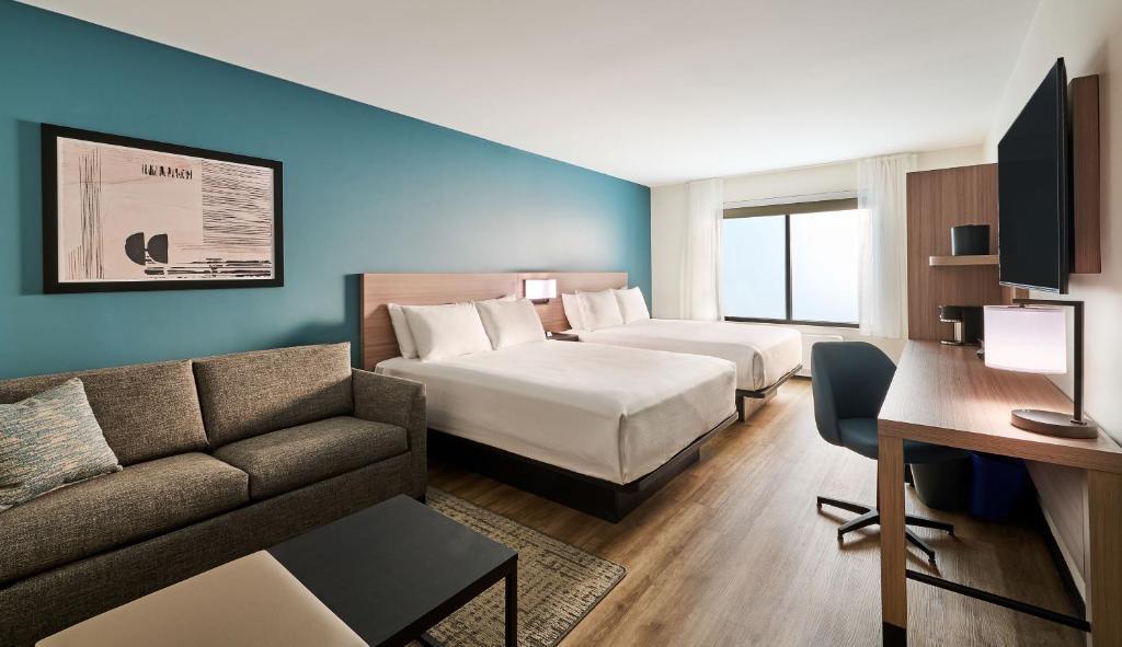 Queen Room with Two Queen Beds and Sofa Bed