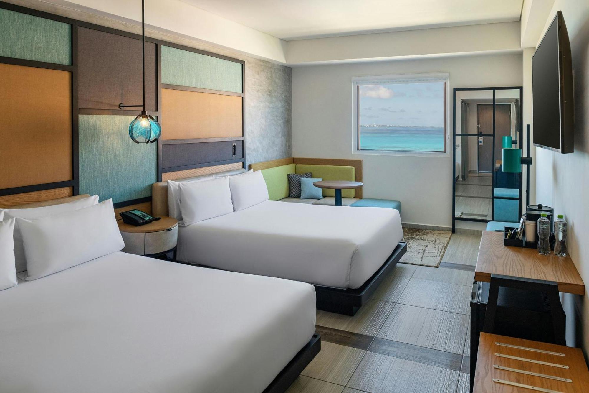Aloft Ocean View Guest room 2 Queen Complimentary open bar