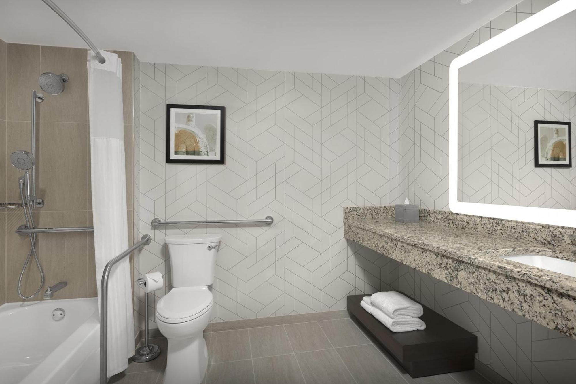 Queen Room Bath Tub Mobility or Hearing Accessible