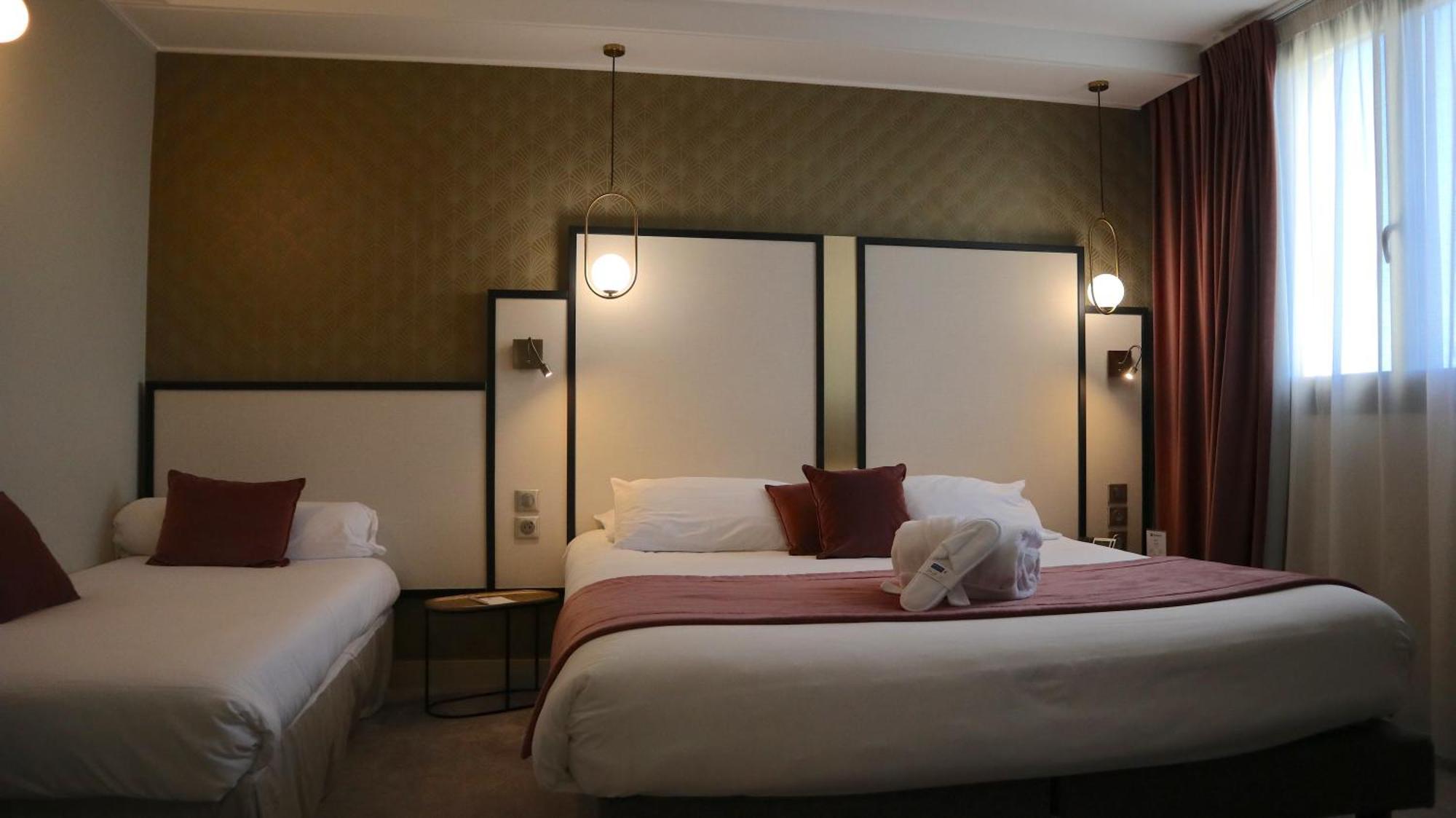 Executive Room One King One Single Bed Non-Smoking
