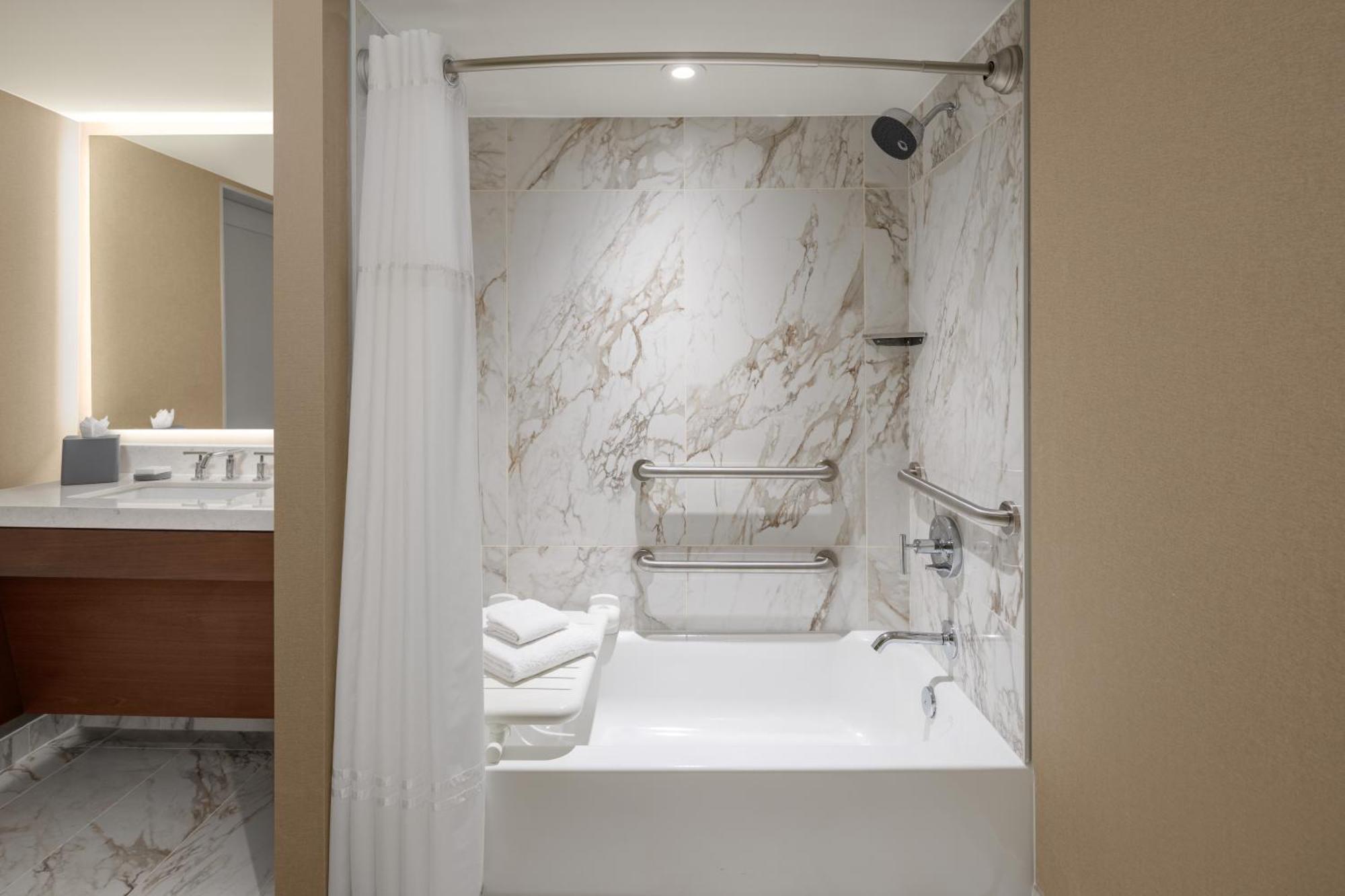 King Room Adapted Tub Mobility Hearing Accessible