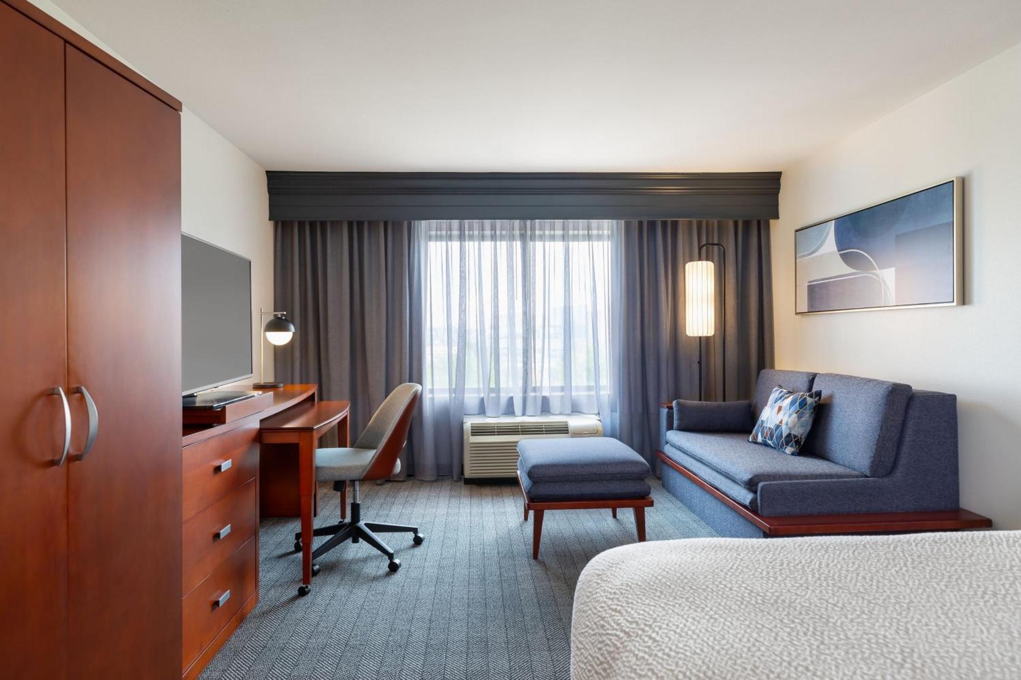 Room One Specialty Bed Bathtub Mobility Access or Hearing Accessible
