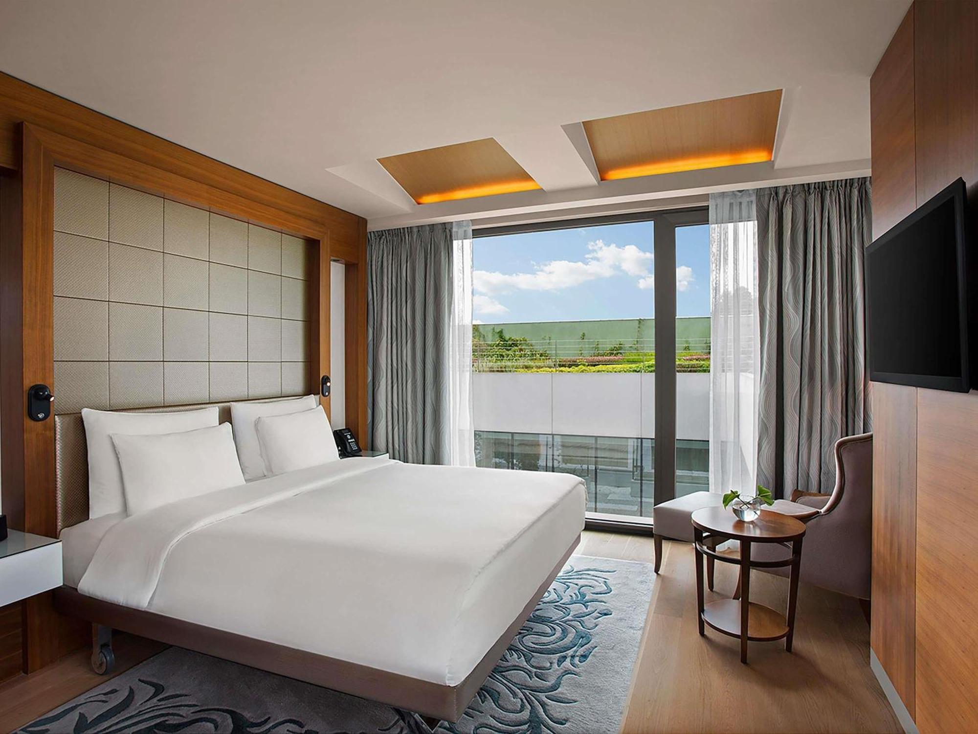 Superior Zimmer mit Kingsize-Bett und Gartenblick